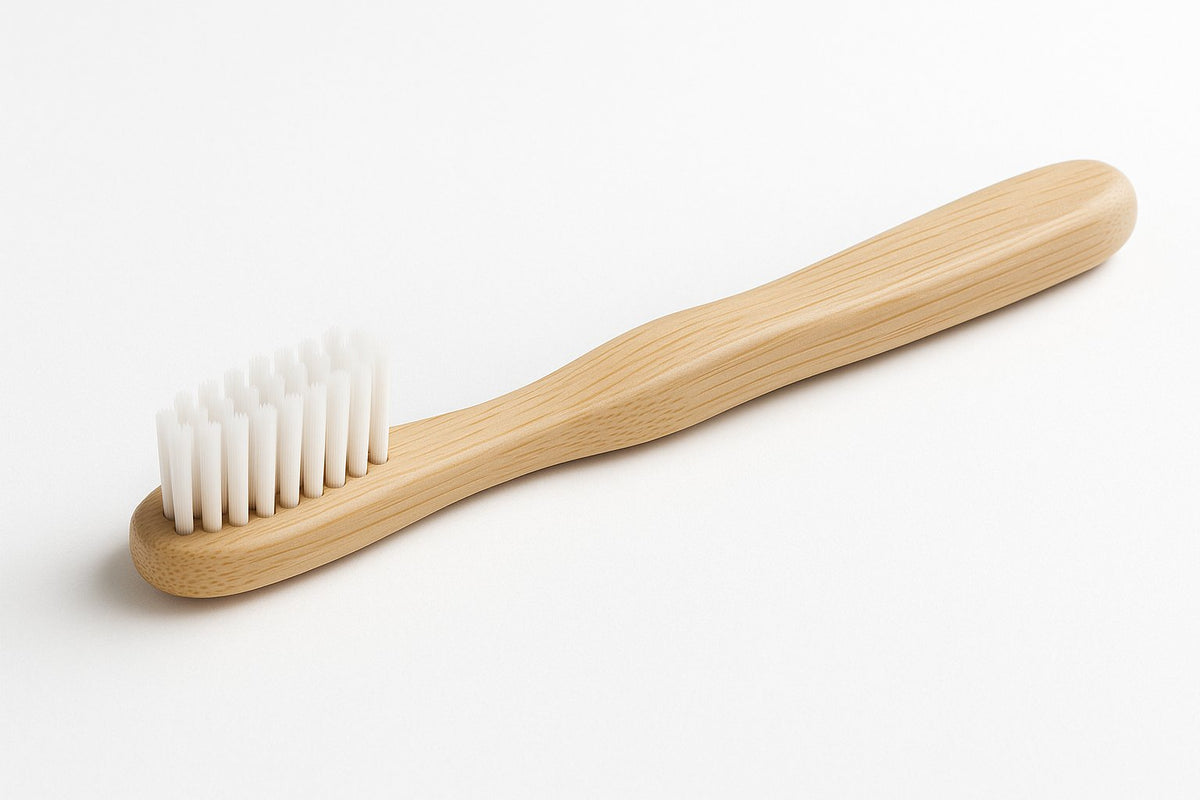 Eco-friendly bamboo toothbrushes on a clean surface, sustainable alternatives to plastic toothbrushes.