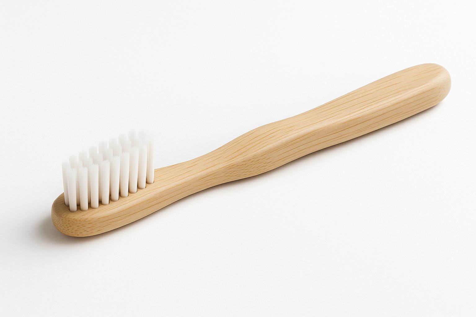 Eco-friendly bamboo toothbrushes on a clean surface, sustainable alternatives to plastic toothbrushes.