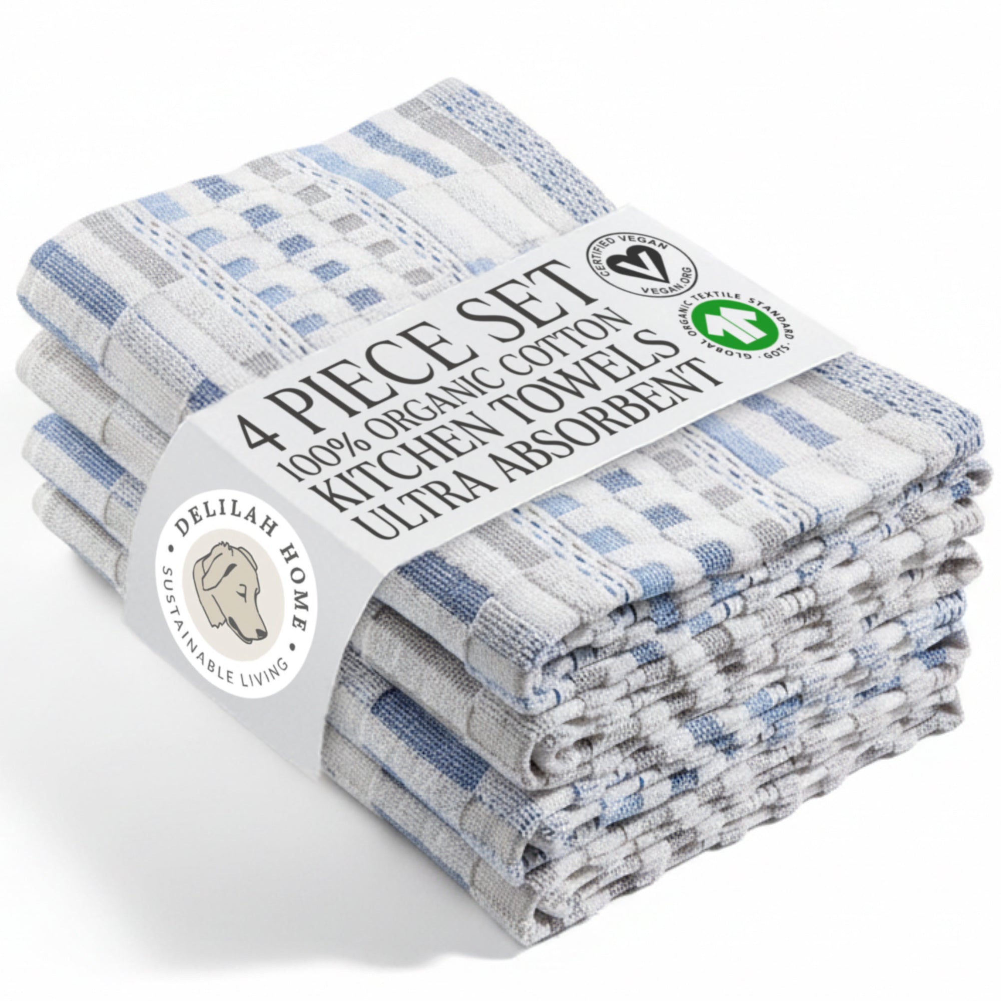 Stack of 4-piece organic cotton kitchen towel set with visible brand labels on a white background