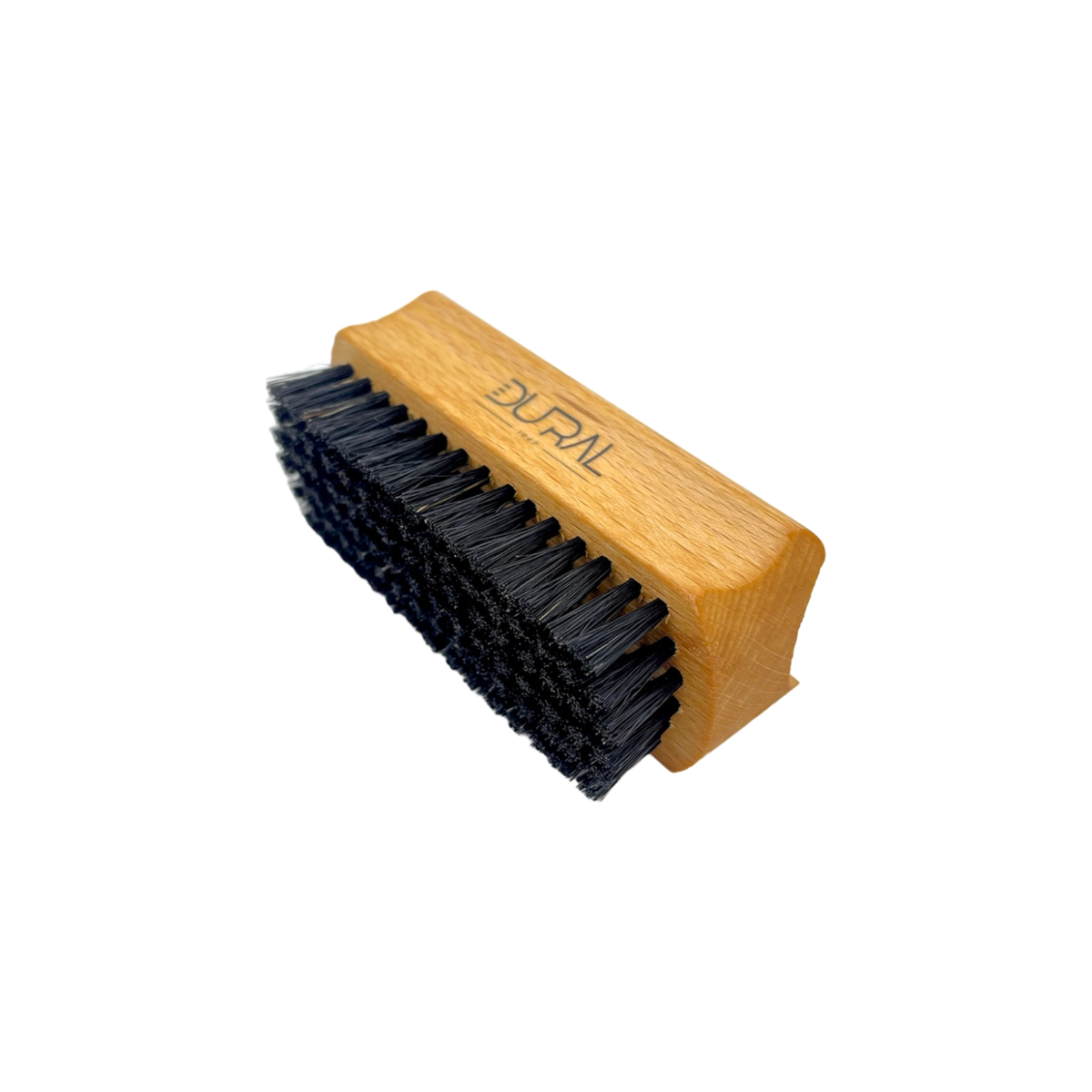 Wooden brush with black bristles on a white background