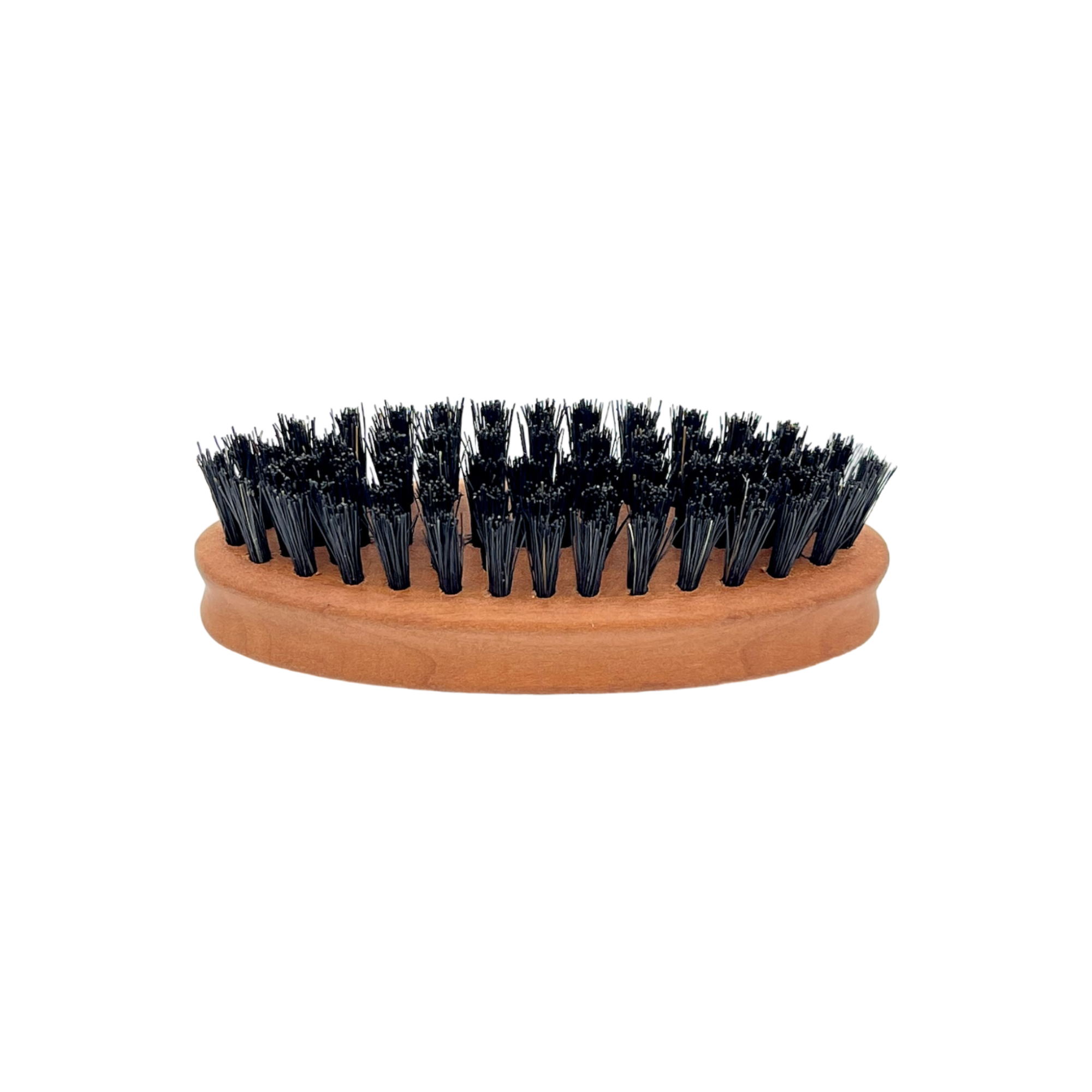 Wooden brush with black bristles on a white background