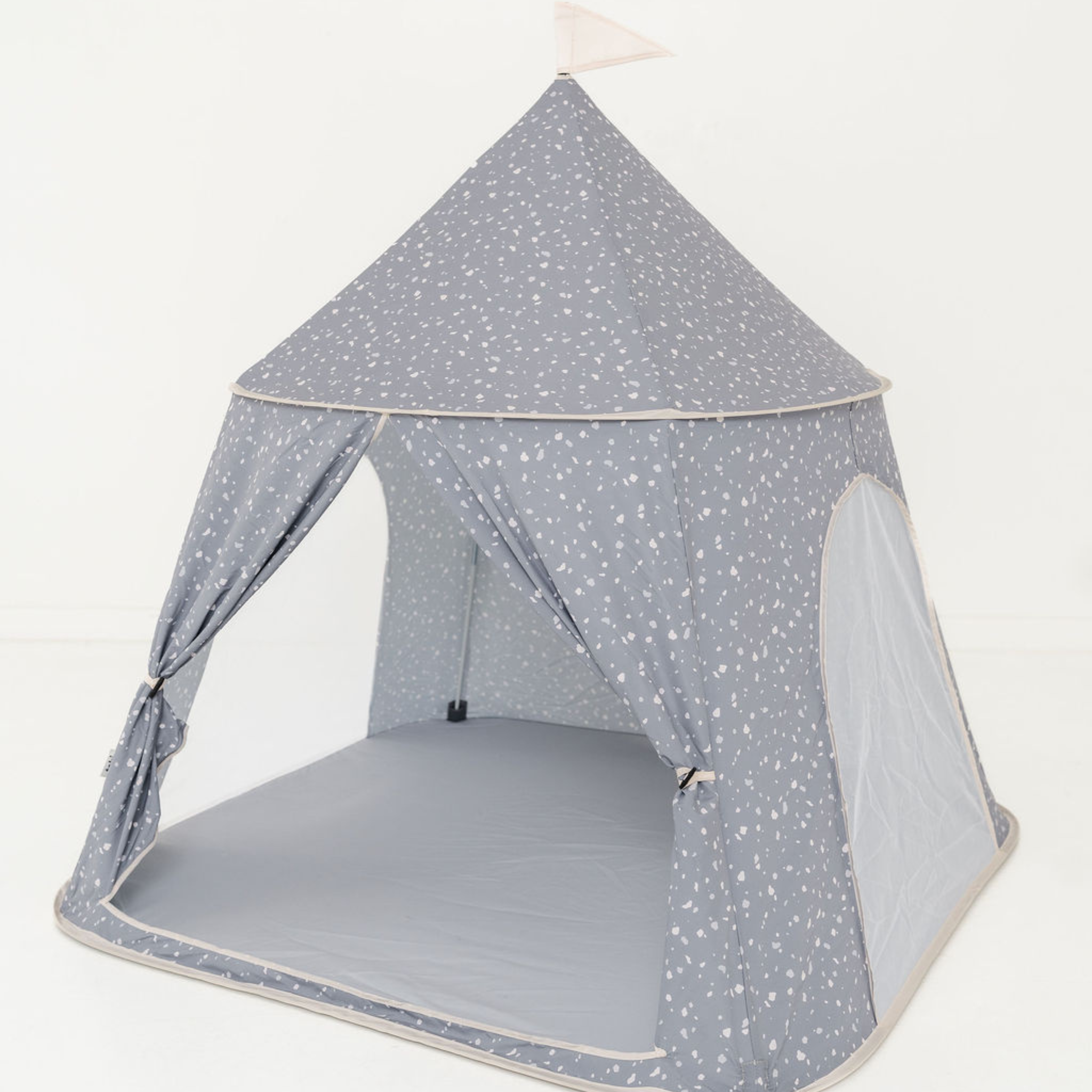 Children's play tent with star pattern on a white background