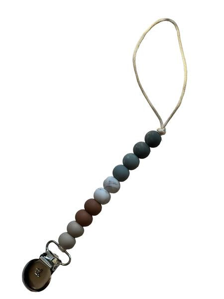 Beaded pacifier clip with a white background
