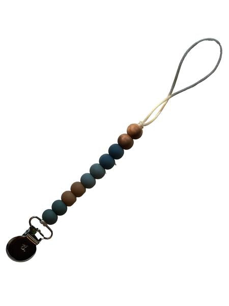 Pacifier clip with multicolored beads on a white background
