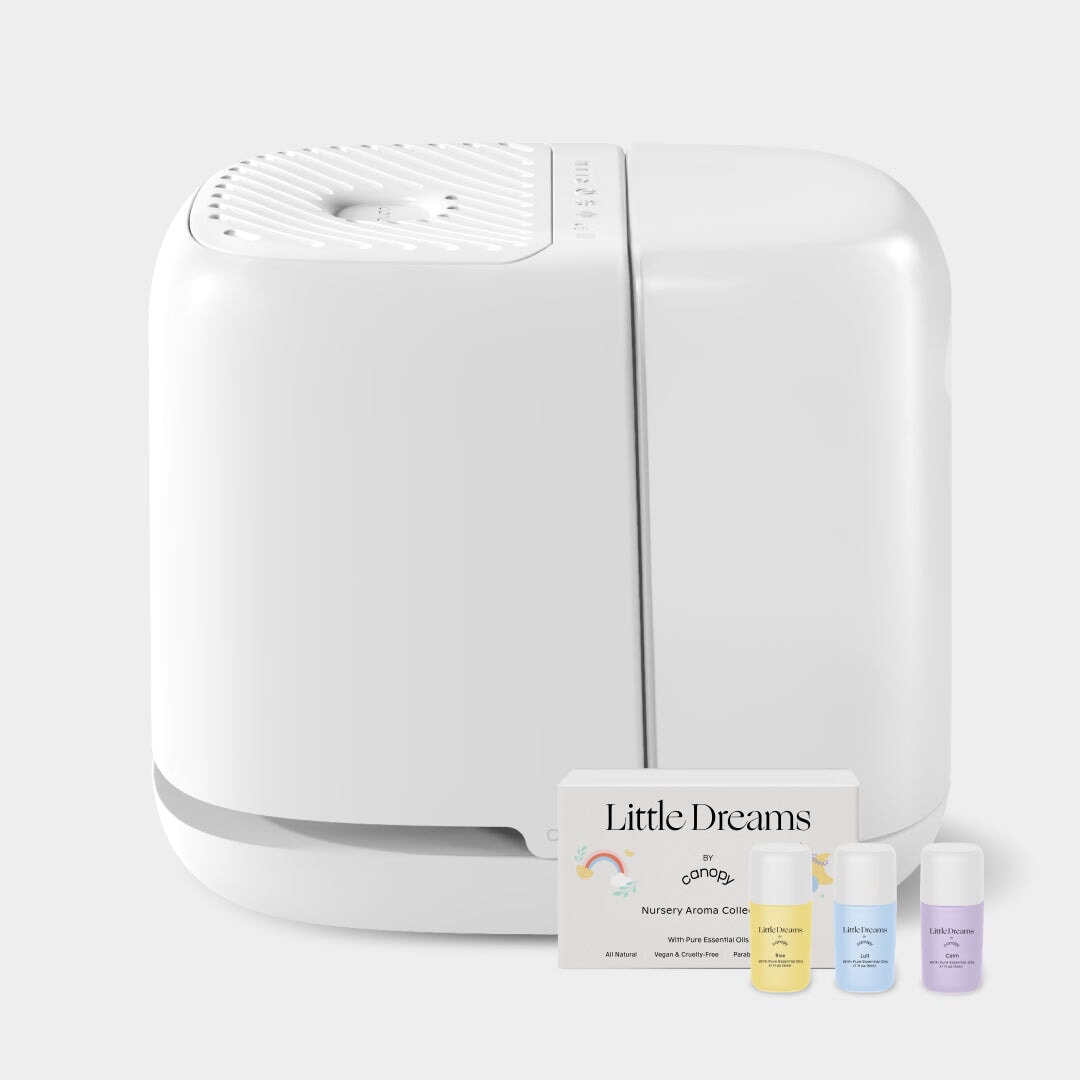 White humidifier with 'Little Dreams' branded items on a light gray background