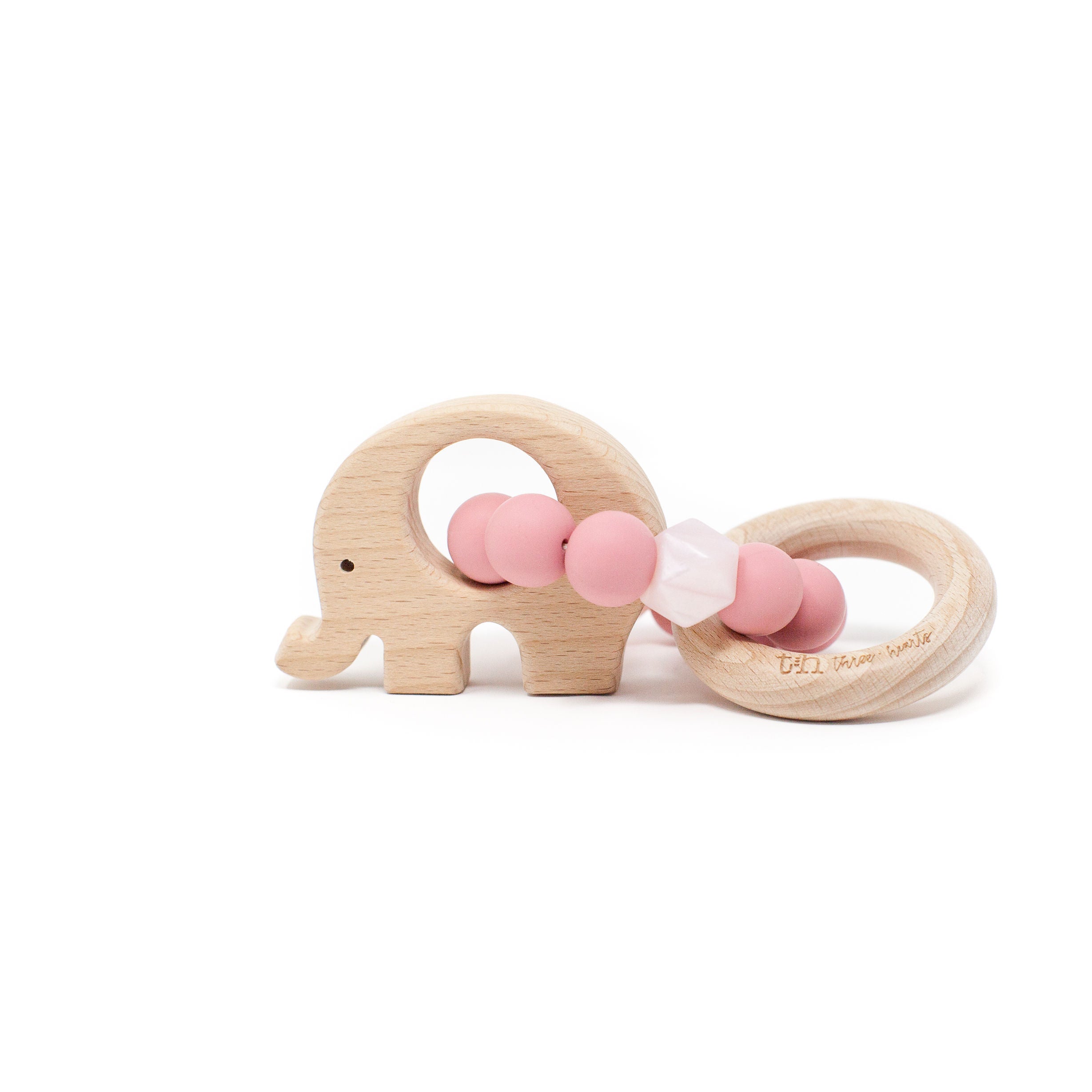 Wooden elephant-shaped teether with pink and white beads on a white background
