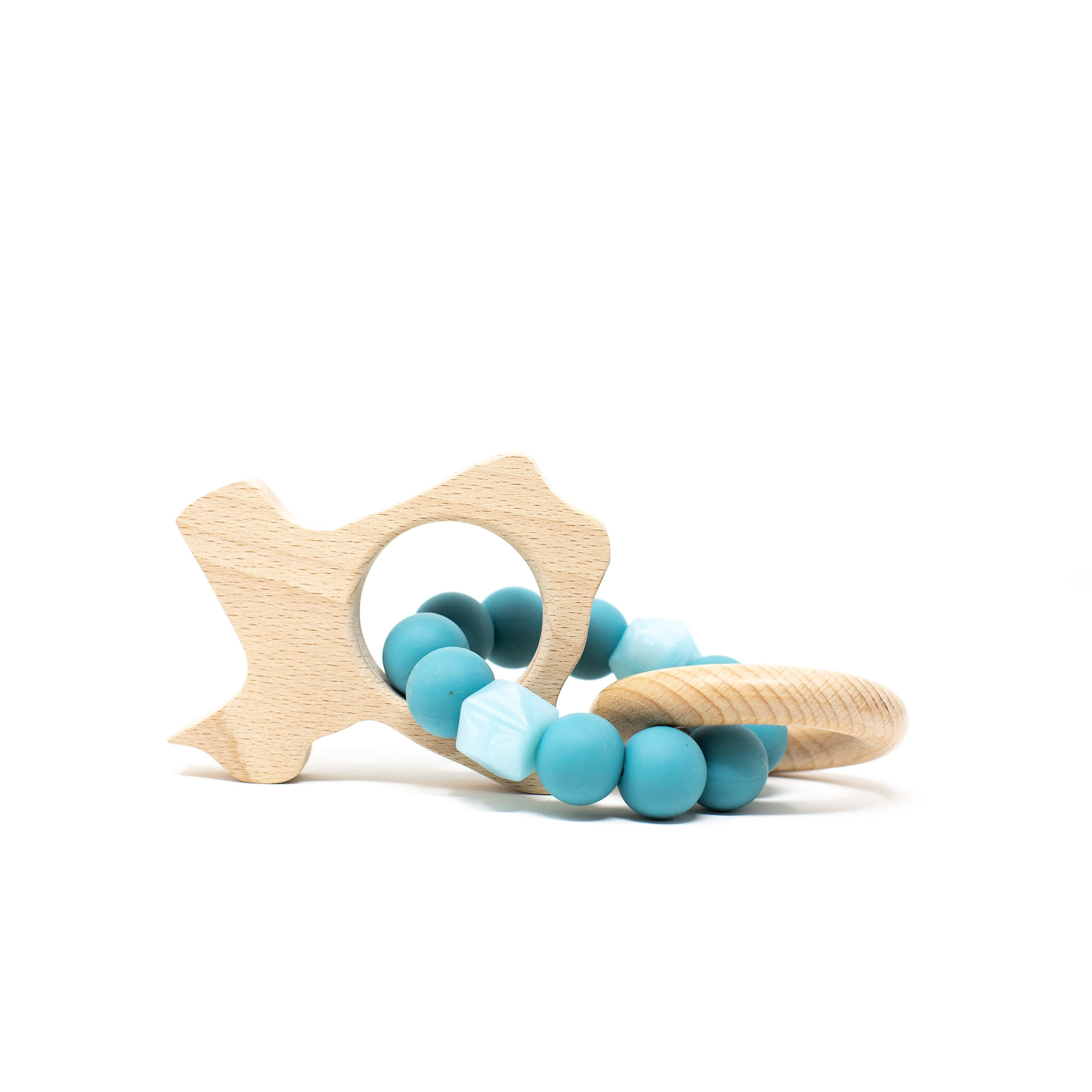 Teething ring with turquoise beads and wooden star design on a white background