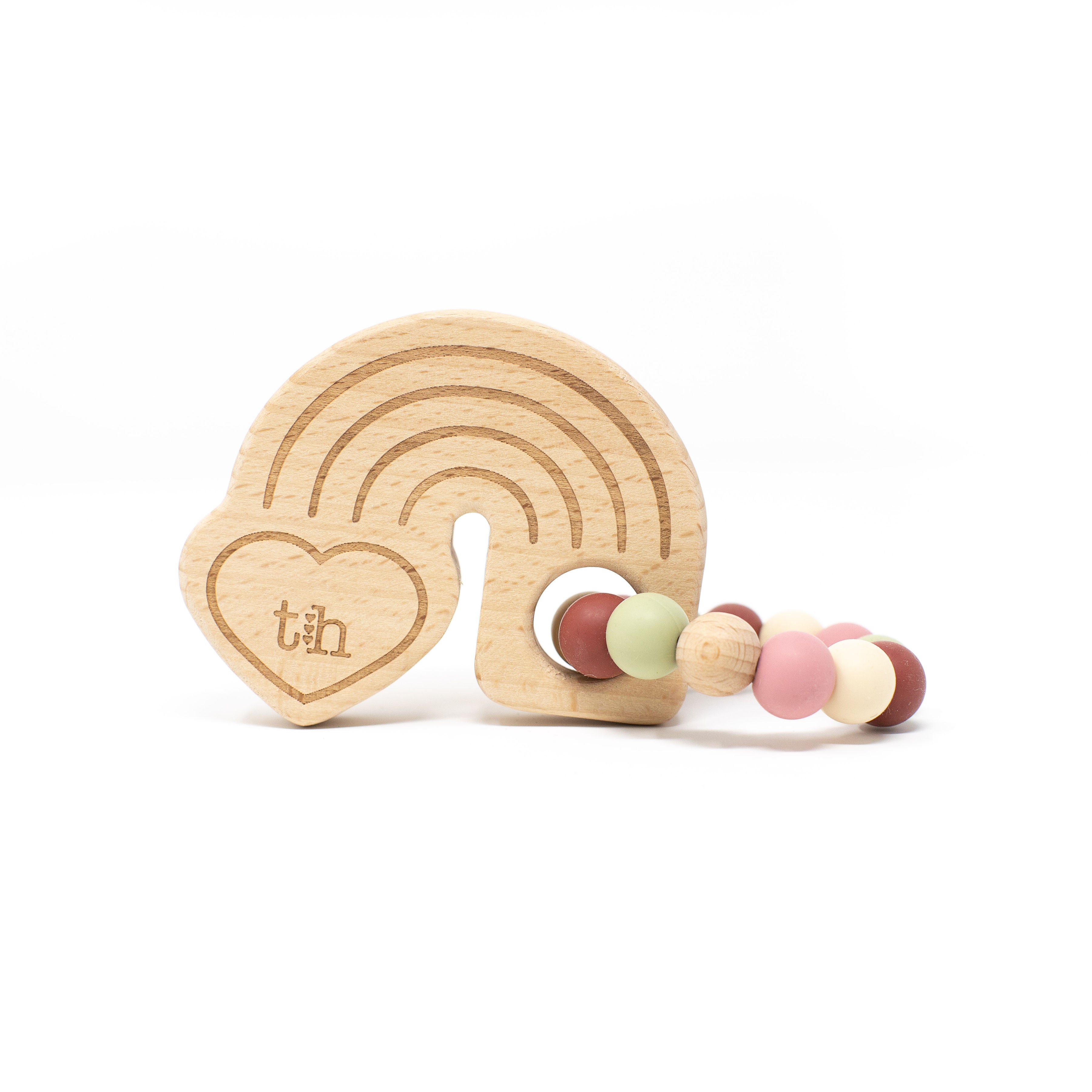 Wooden teething ring with colorful beads on a white background