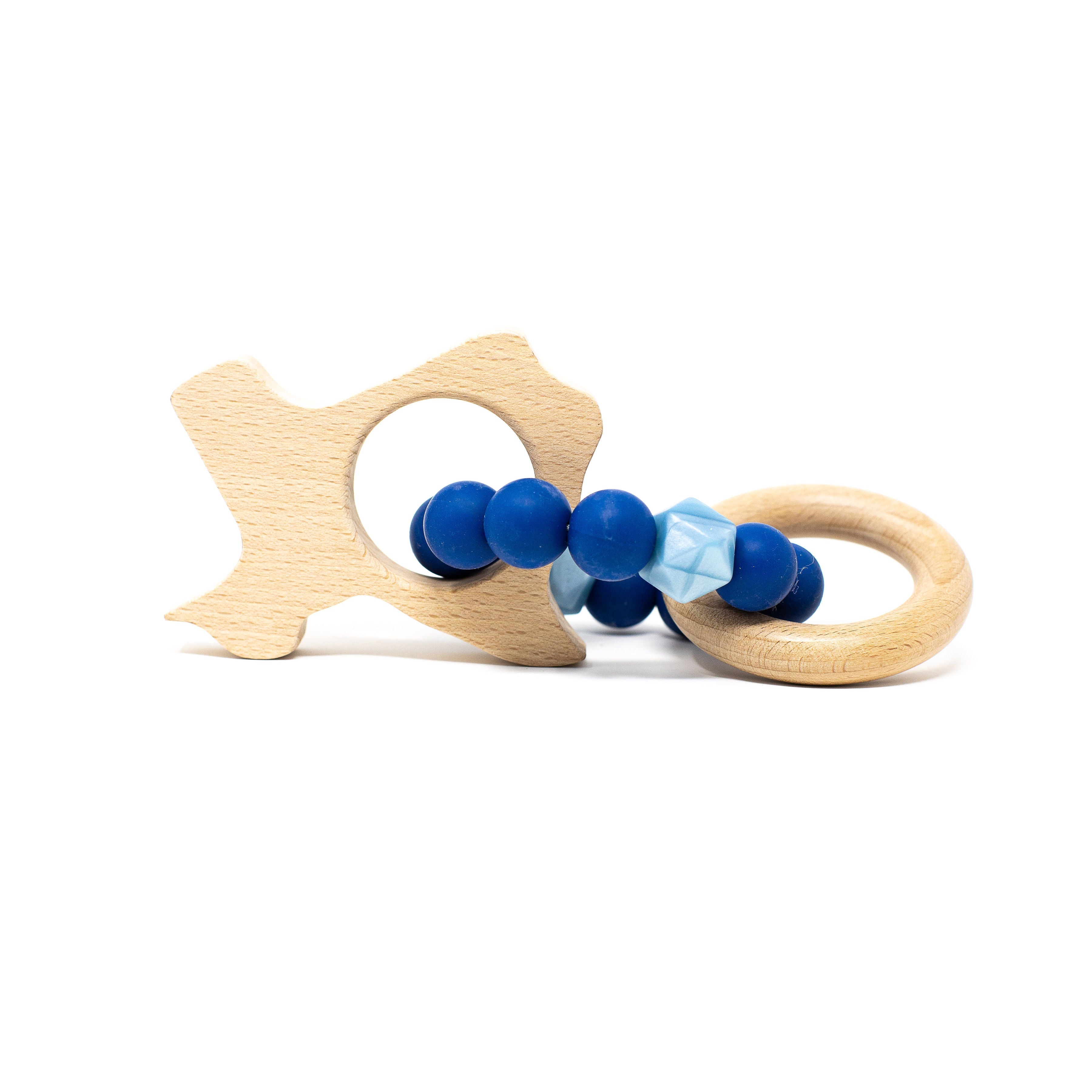 Wooden fish-shaped teething ring with blue silicone beads on a white background
