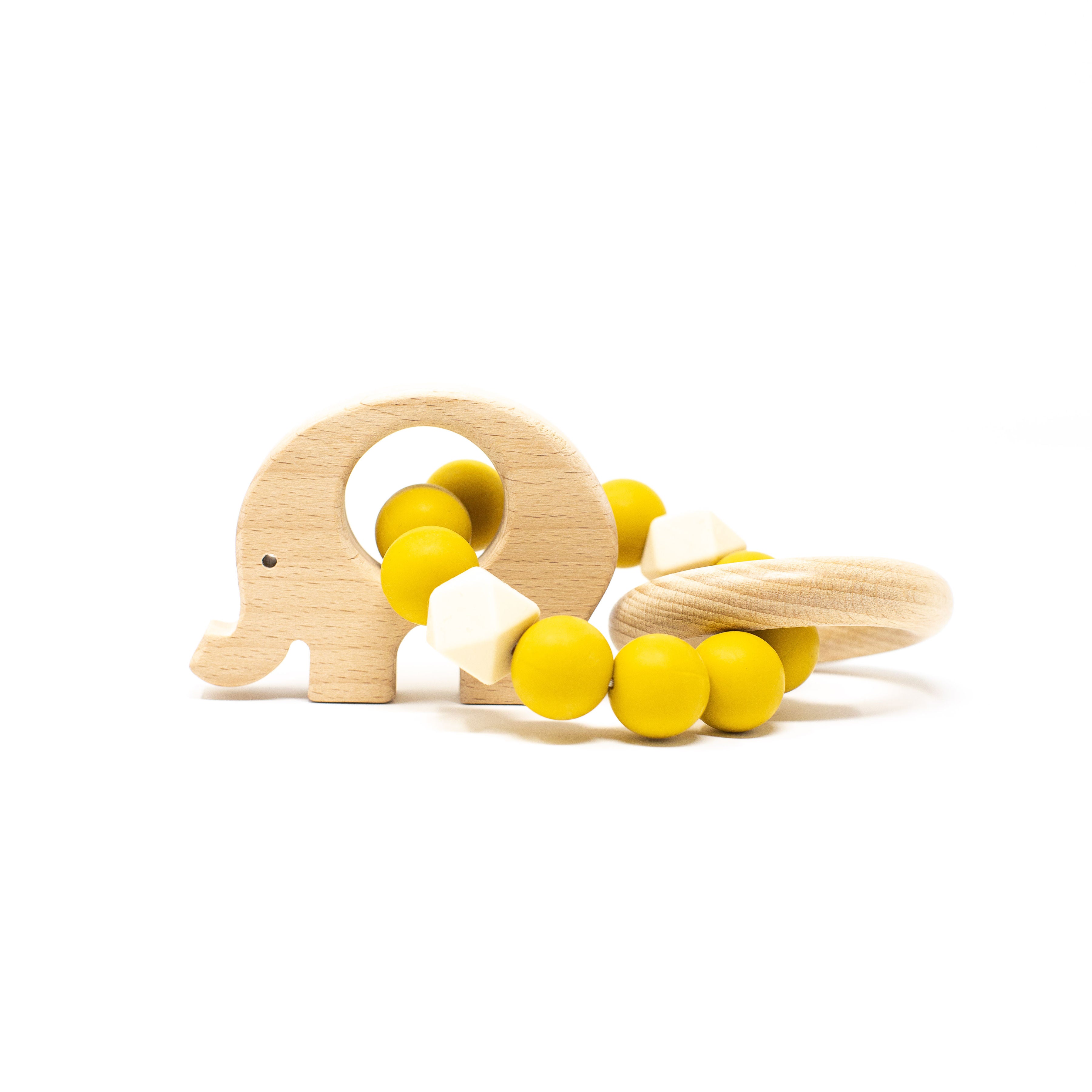 Wooden elephant-shaped teether with yellow beads on a white background
