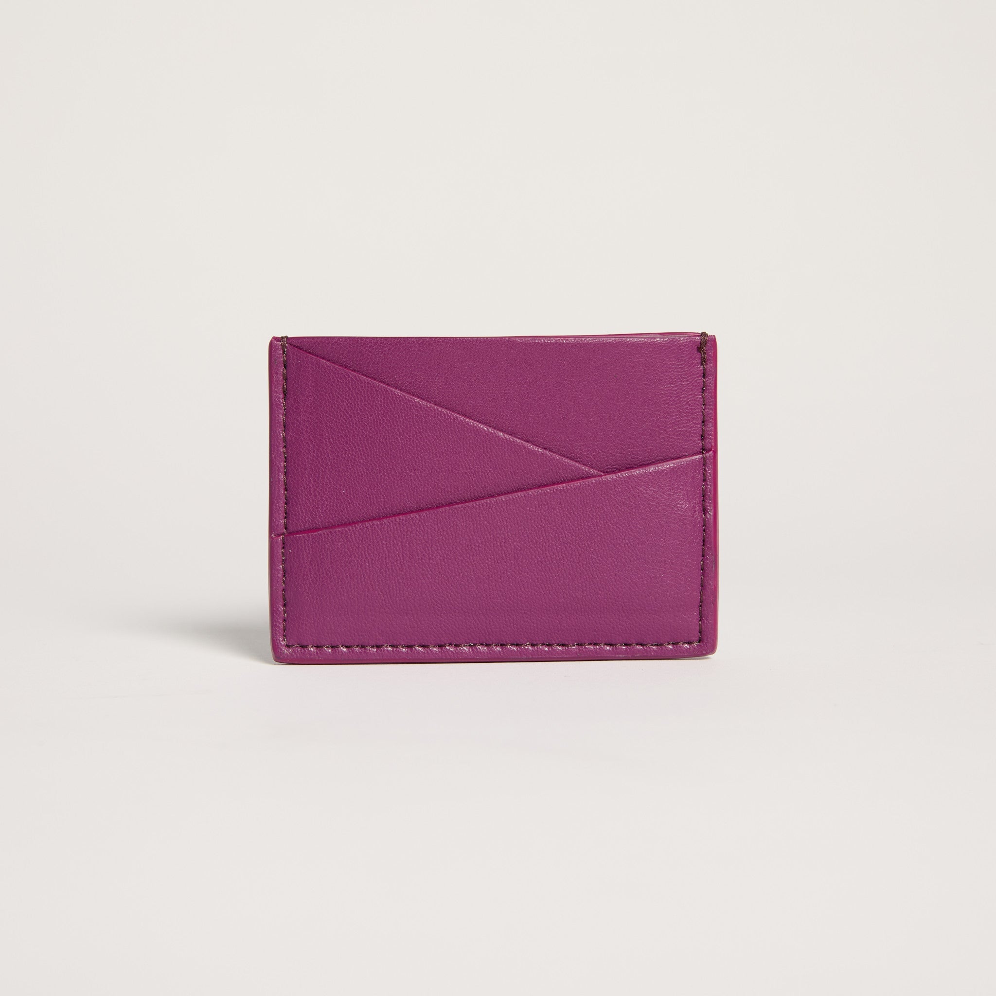 Purple cardholder on a light gray background
