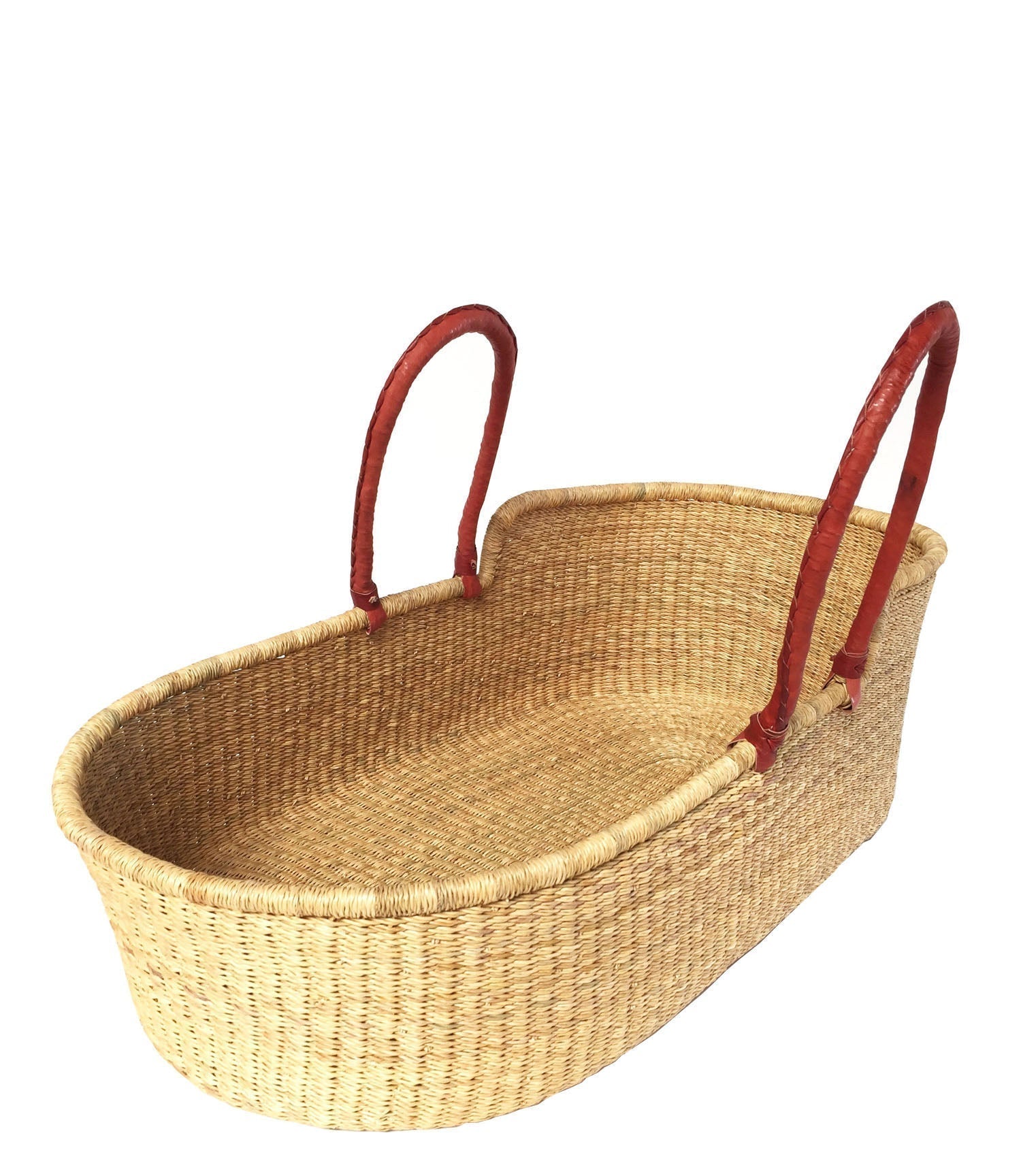 Wicker baby Moses basket with red handles on a white background