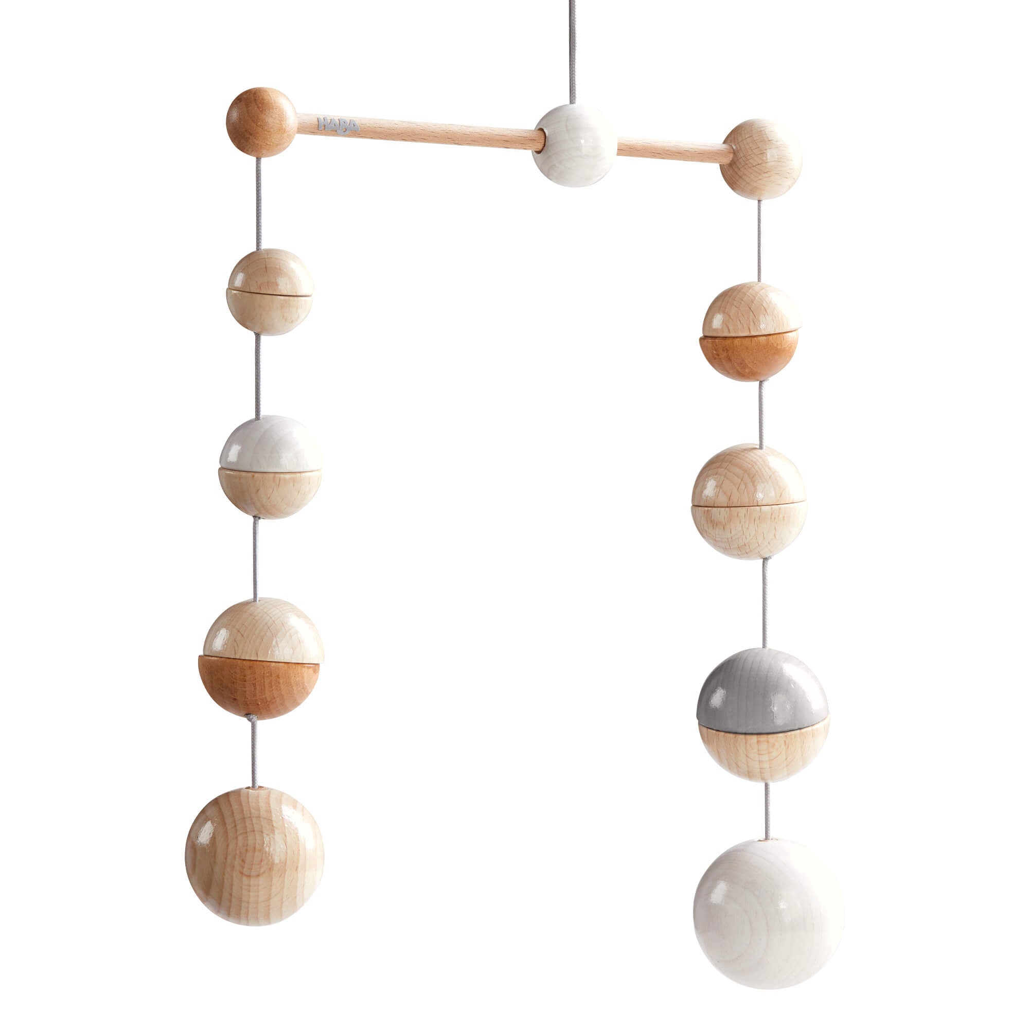 Chandelier with wooden and ceramic balls on a white background