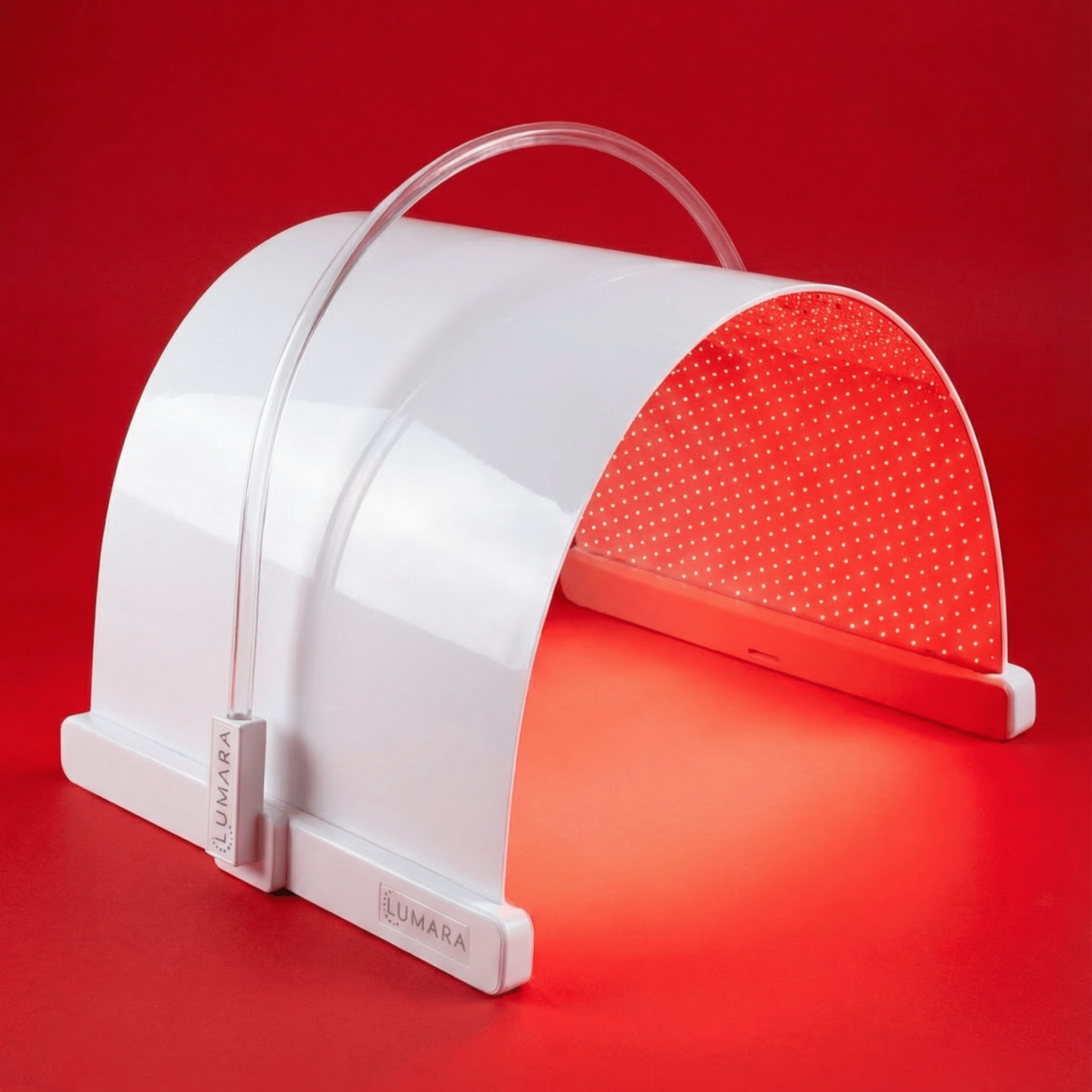 White and red device with a handle on a red background