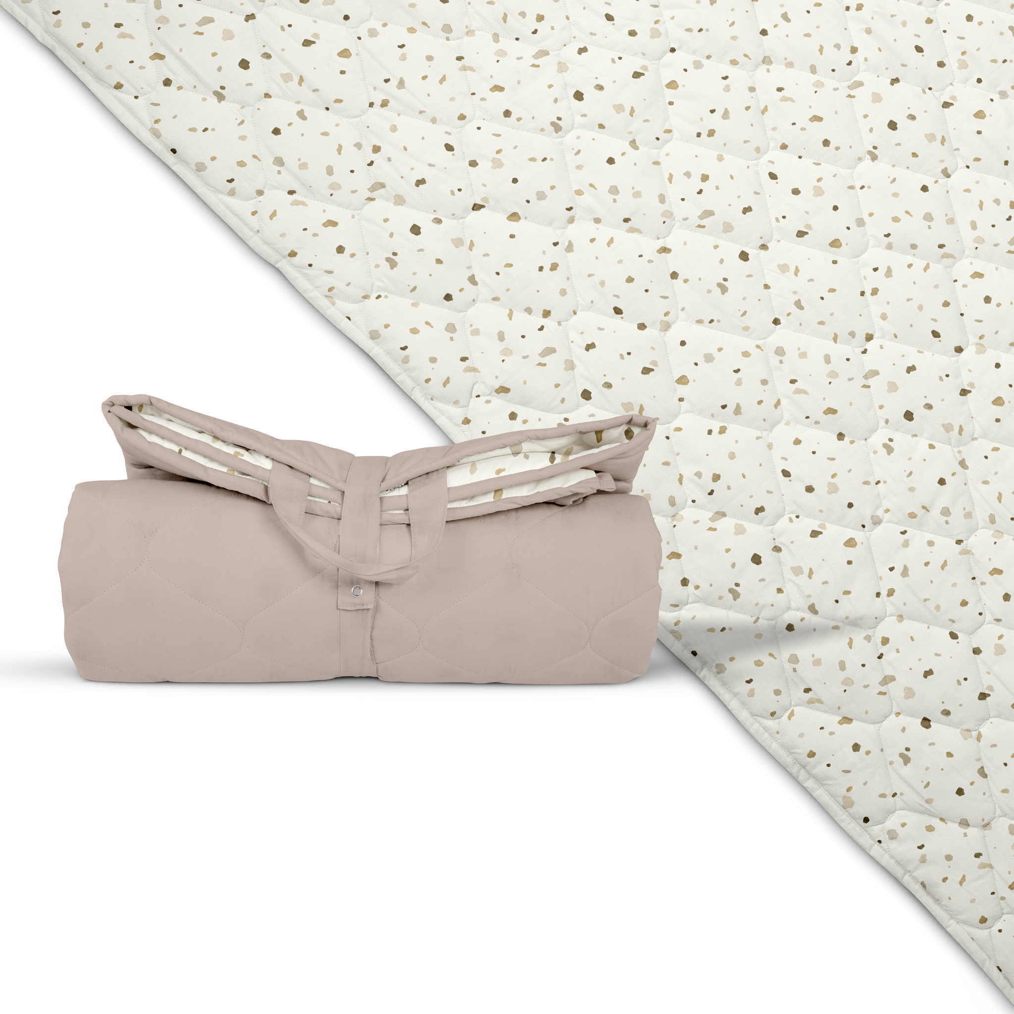 Folded beige blanket with a textured white background