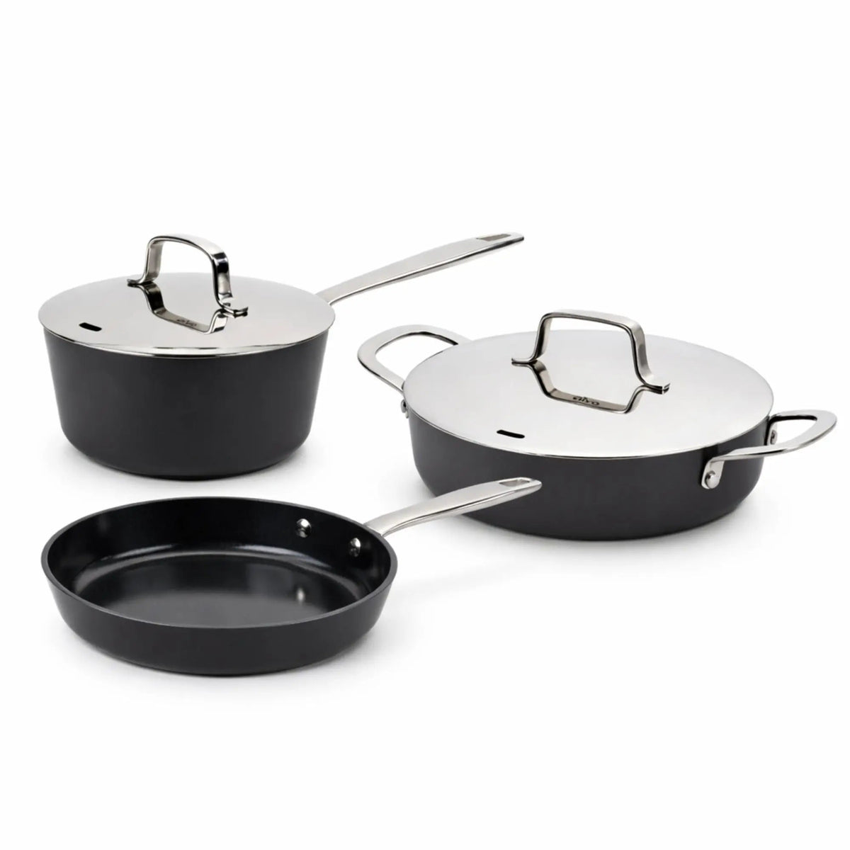 Set of black cookware with lids on a white background
