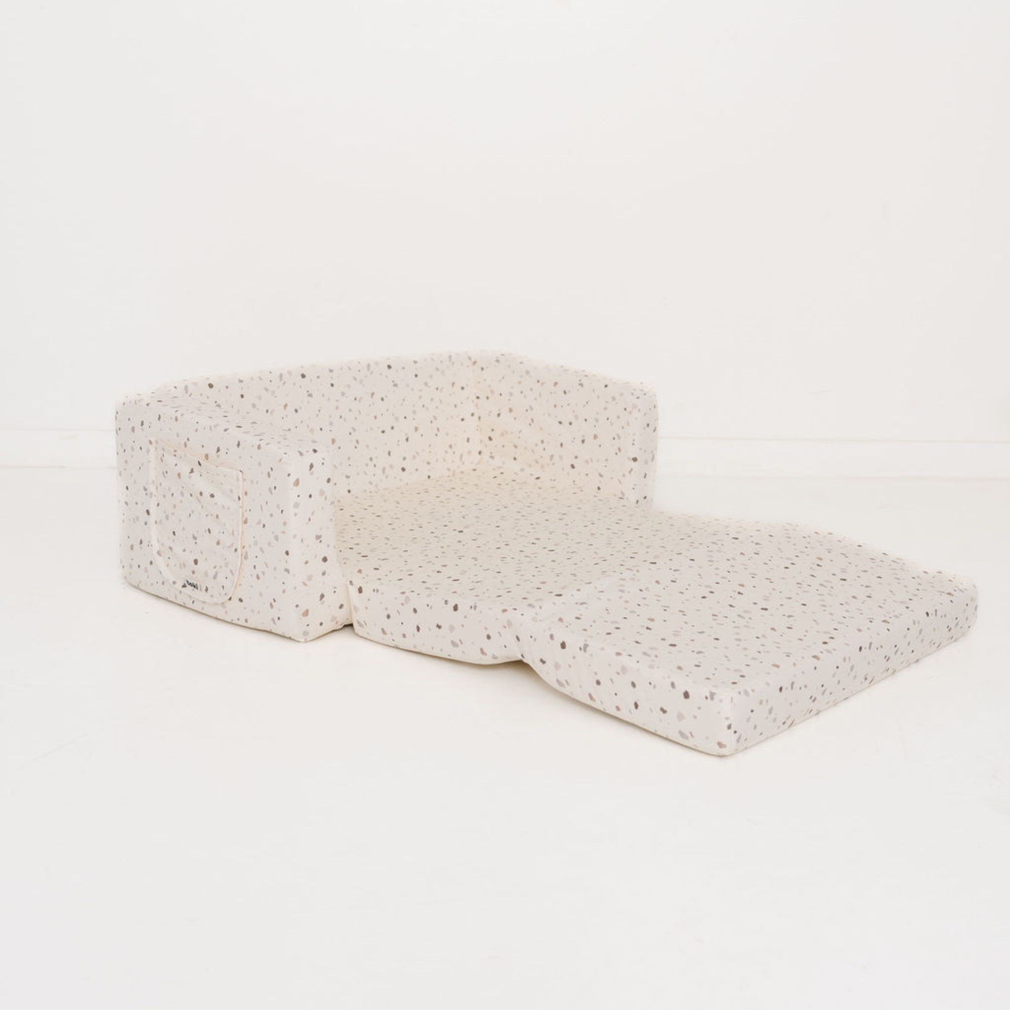Foam wedge pillow with textured surface on a white background