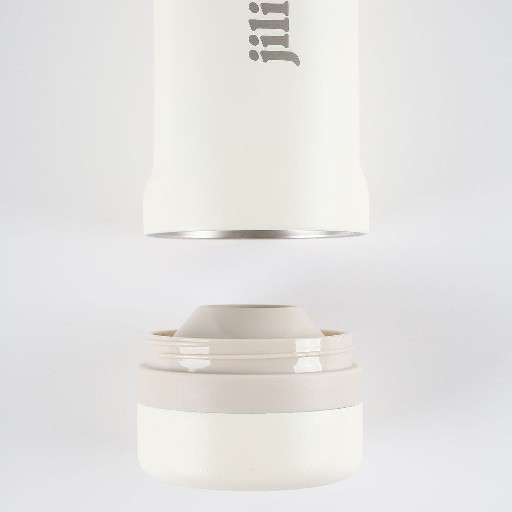 White cylindrical container with a lid on a light gray background, featuring the brand 'jili'.