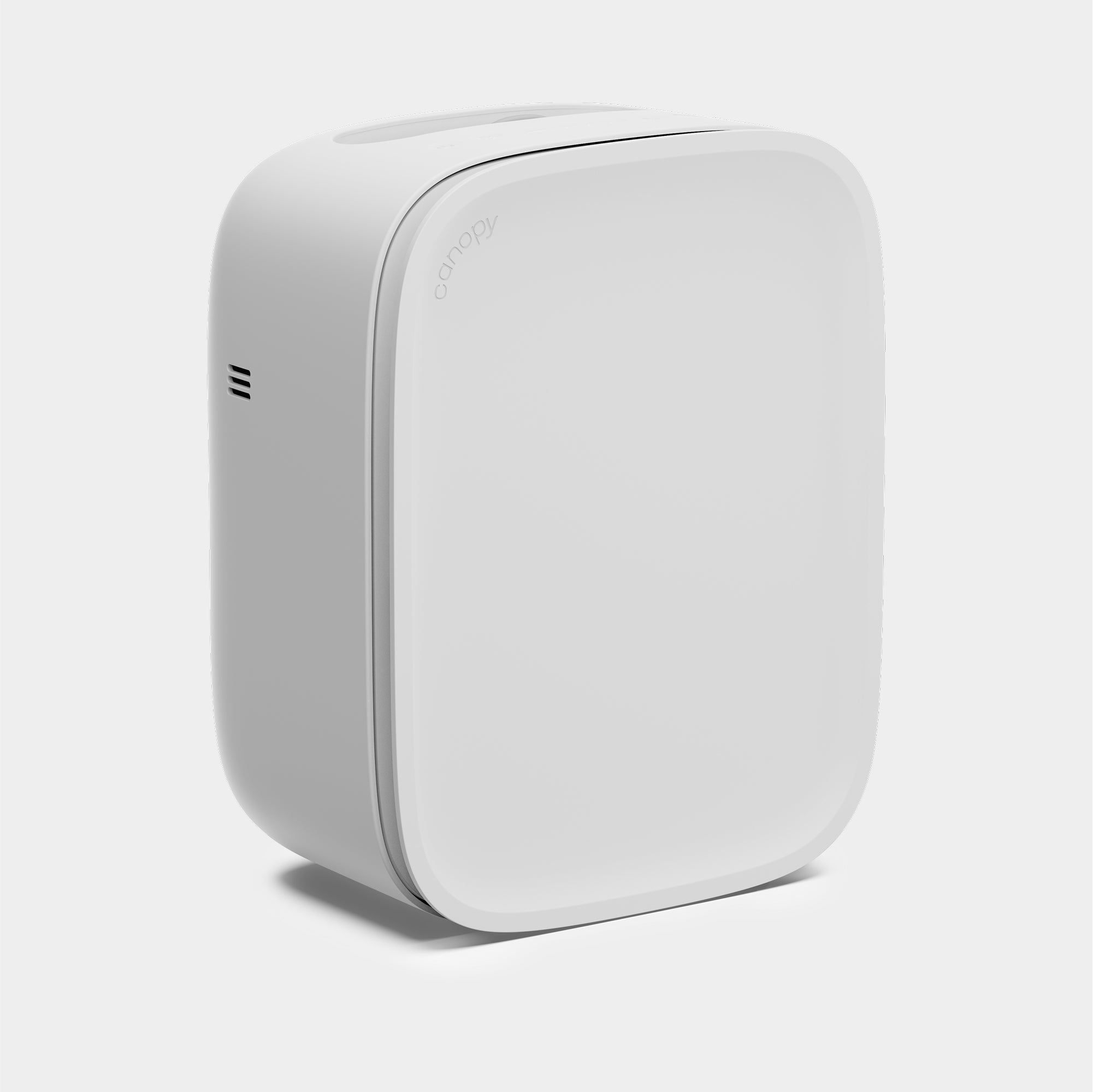 White electronic device on a light gray background