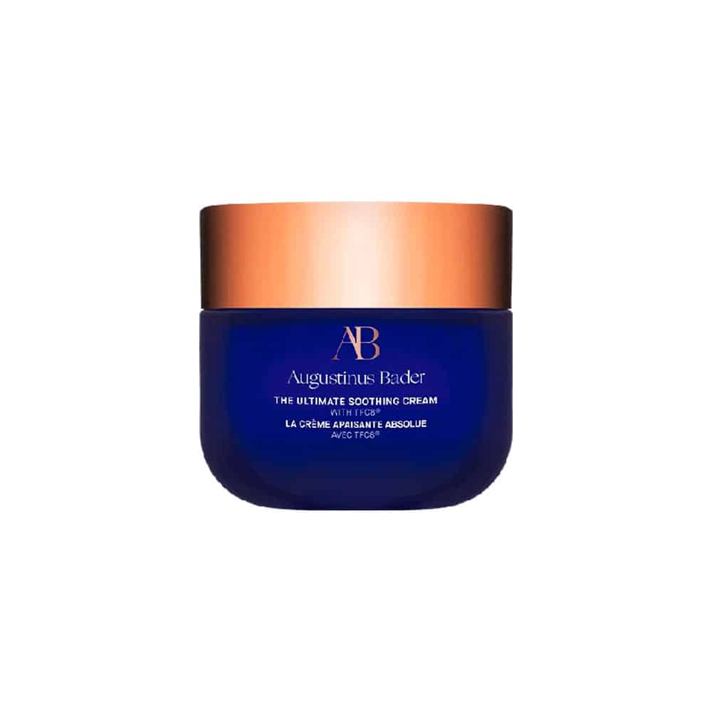 Blue jar with bronze lid on a white background