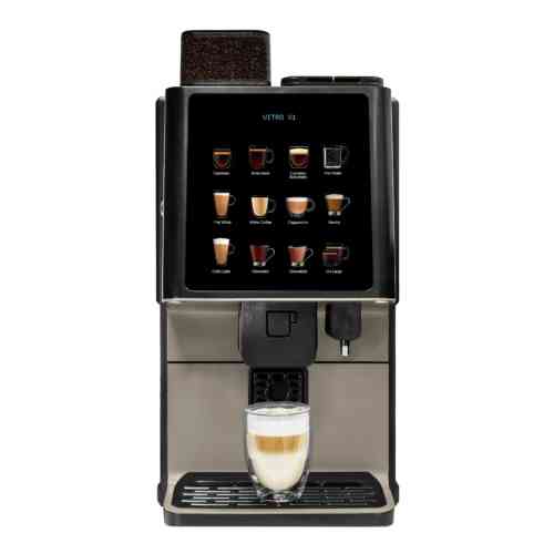 Espresso machine with a glass of cappuccino on a white background