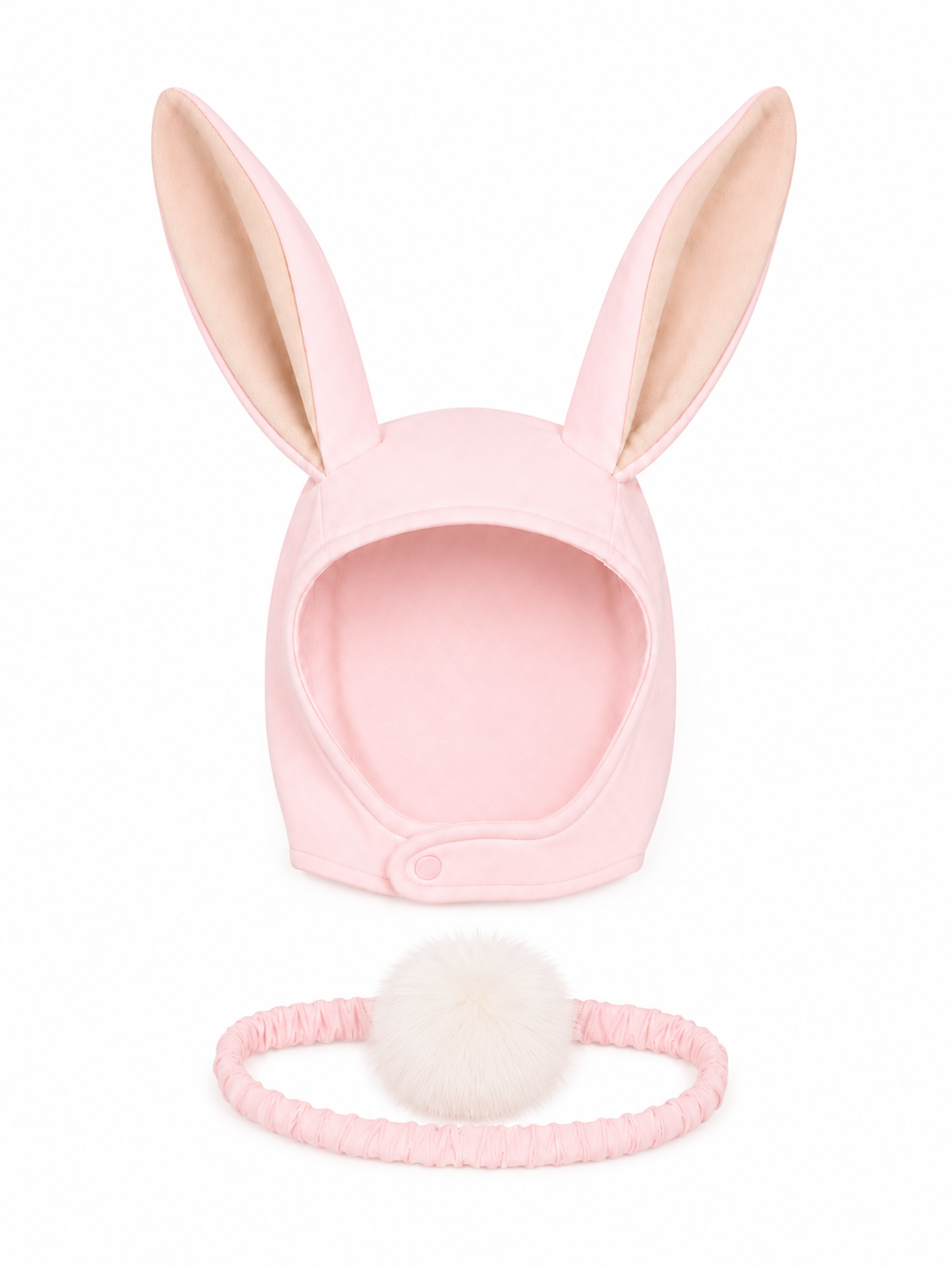 Pink bunny costume with ears and a tail on a white background
