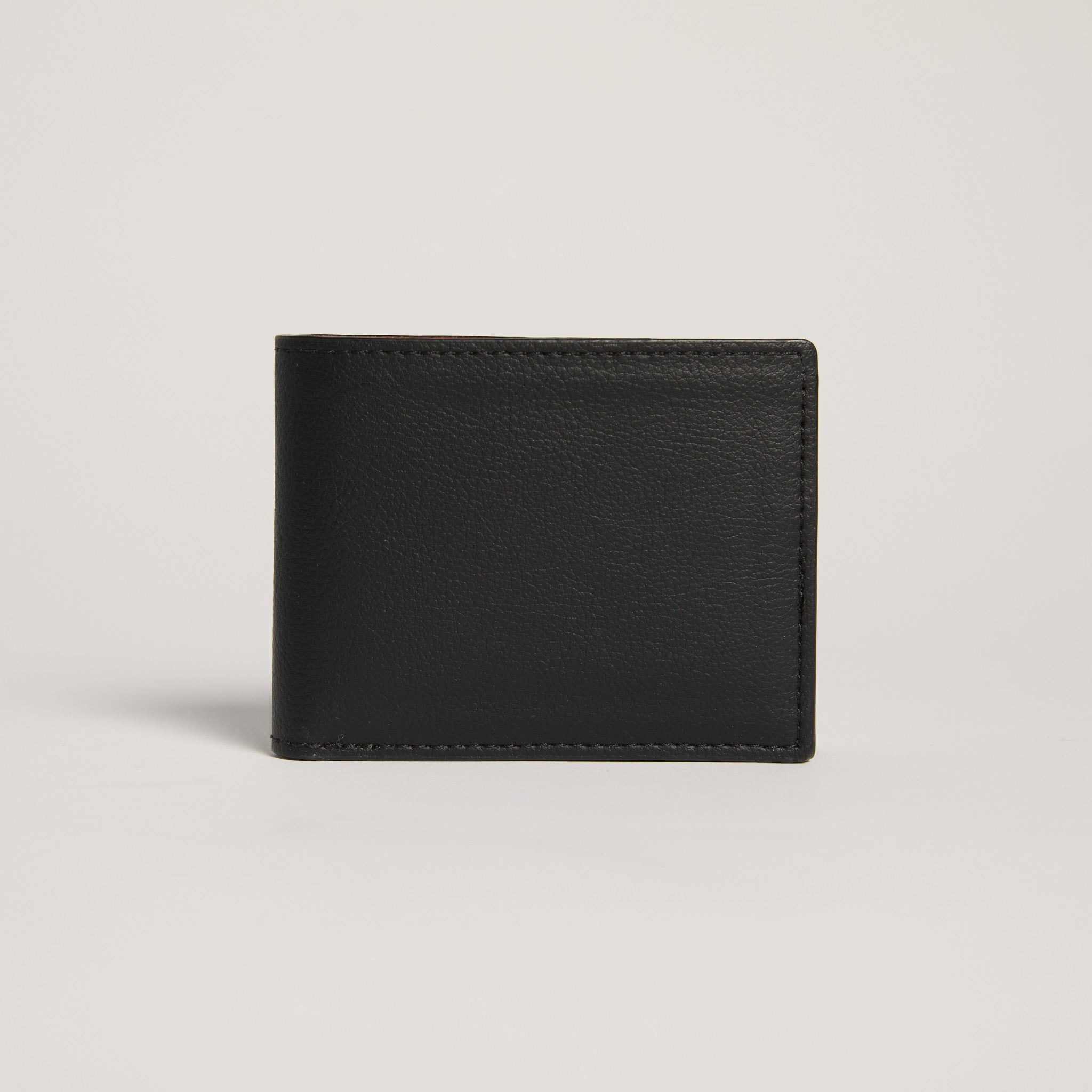Black leather wallet on a light gray background