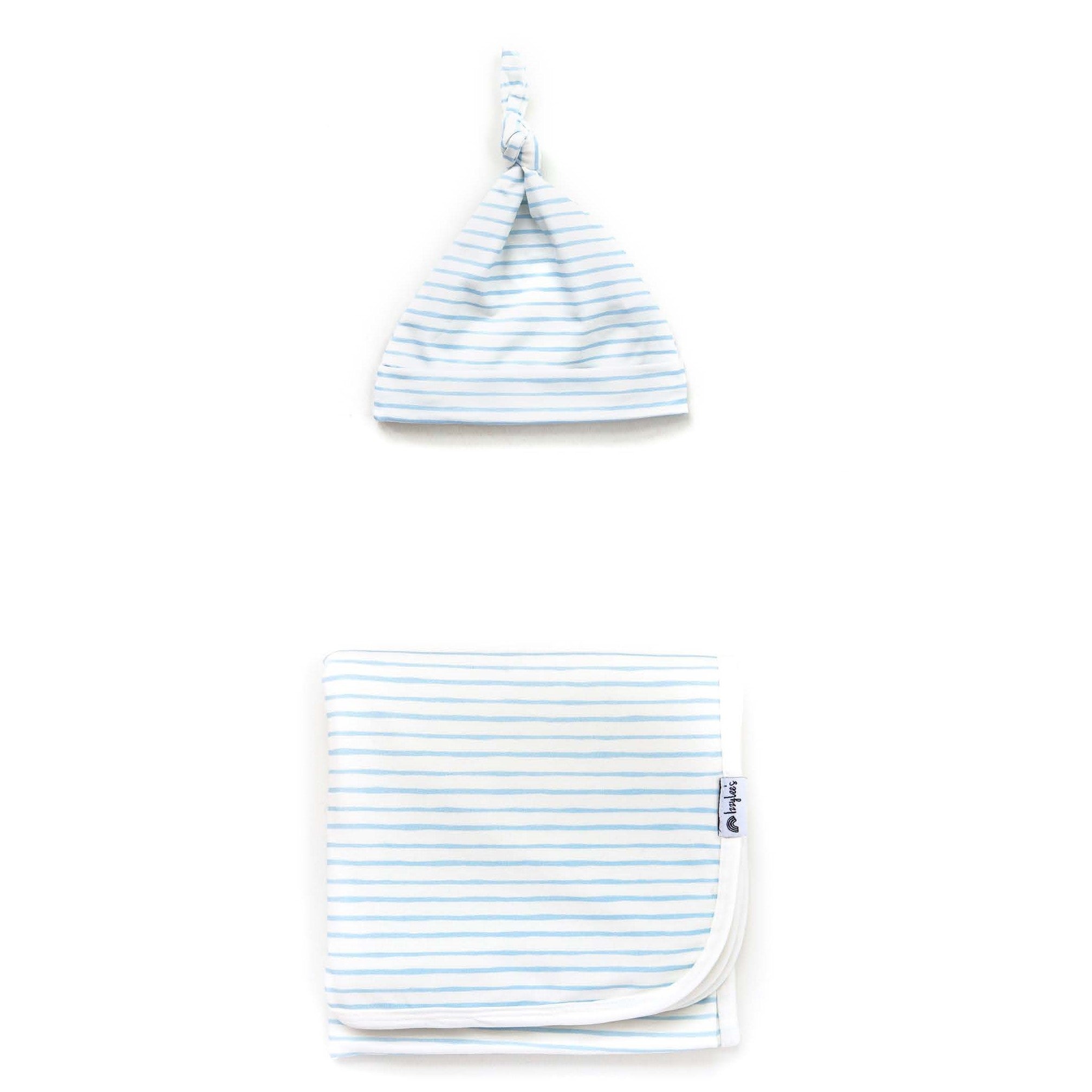 Baby hat and blanket set with blue stripes on a white background