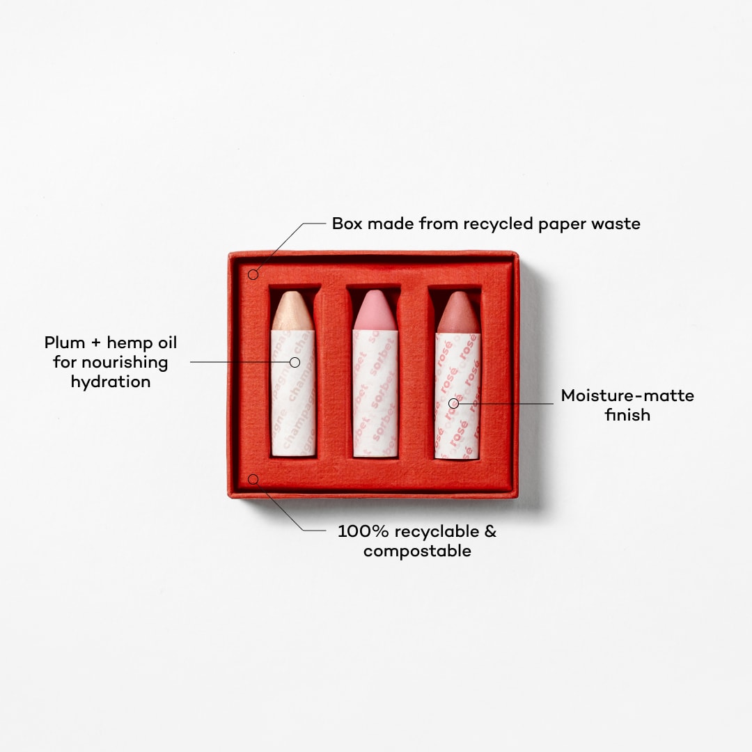 Three white tubes in a red box with text highlighting features on a white background
