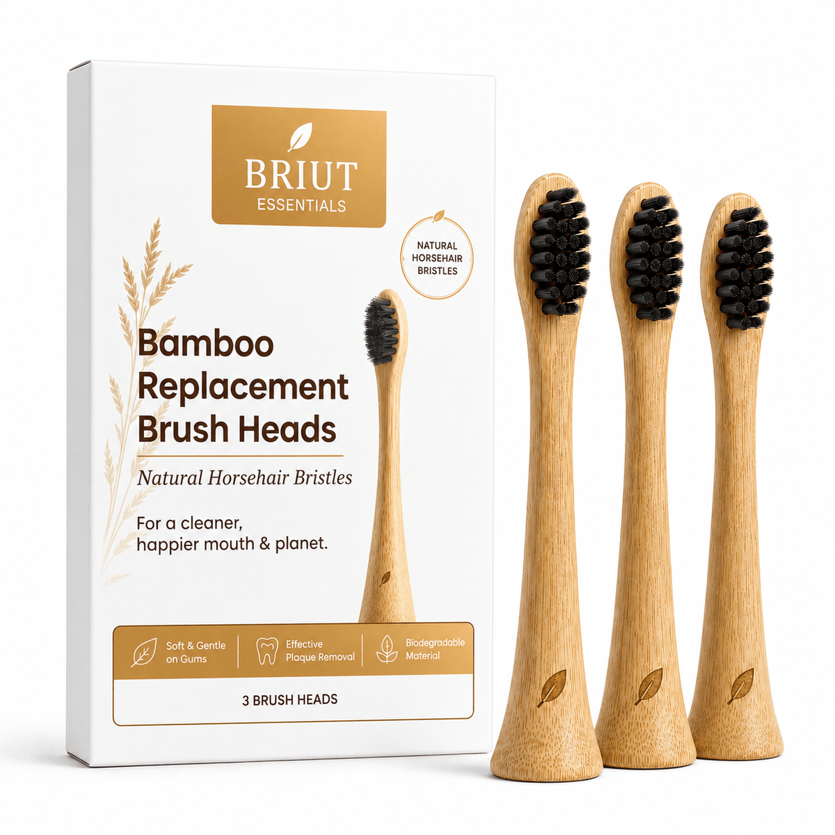 Three bamboo replacement brush heads with black horsehair bristles stand next to their white and gold BRIUT ESSENTials retail box on a clean white background.