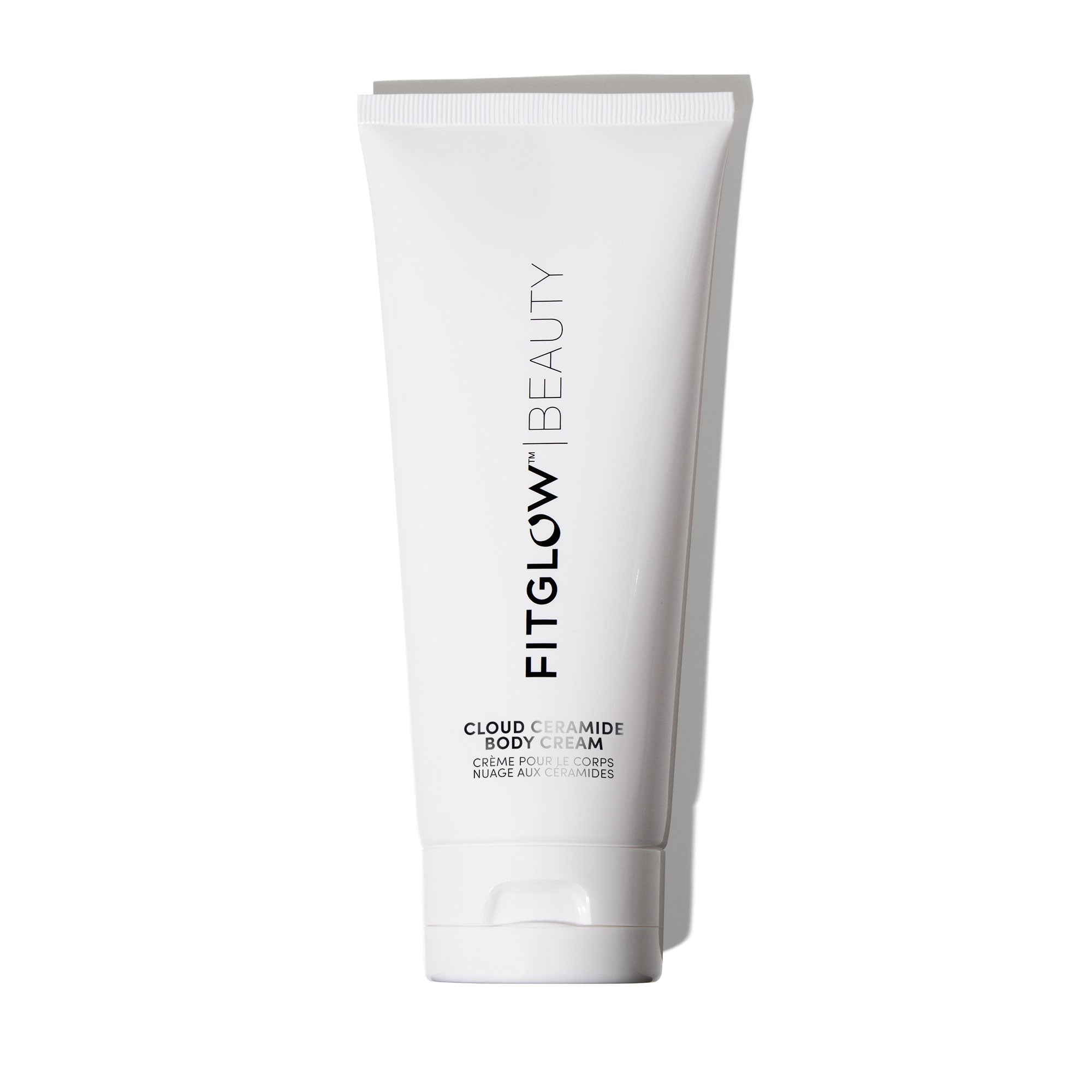 White body cream tube with 'Fitglow Beauty' branding on a white background