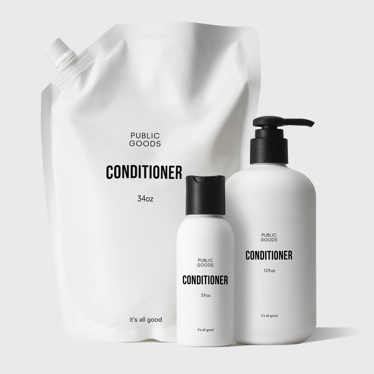 Public Goods conditioner packaging including a large pouch and two bottles on a white background.