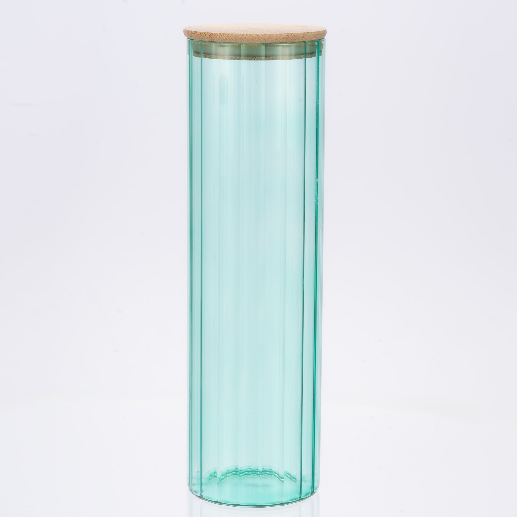 Turquoise glass jar with a wooden lid on a light gray background