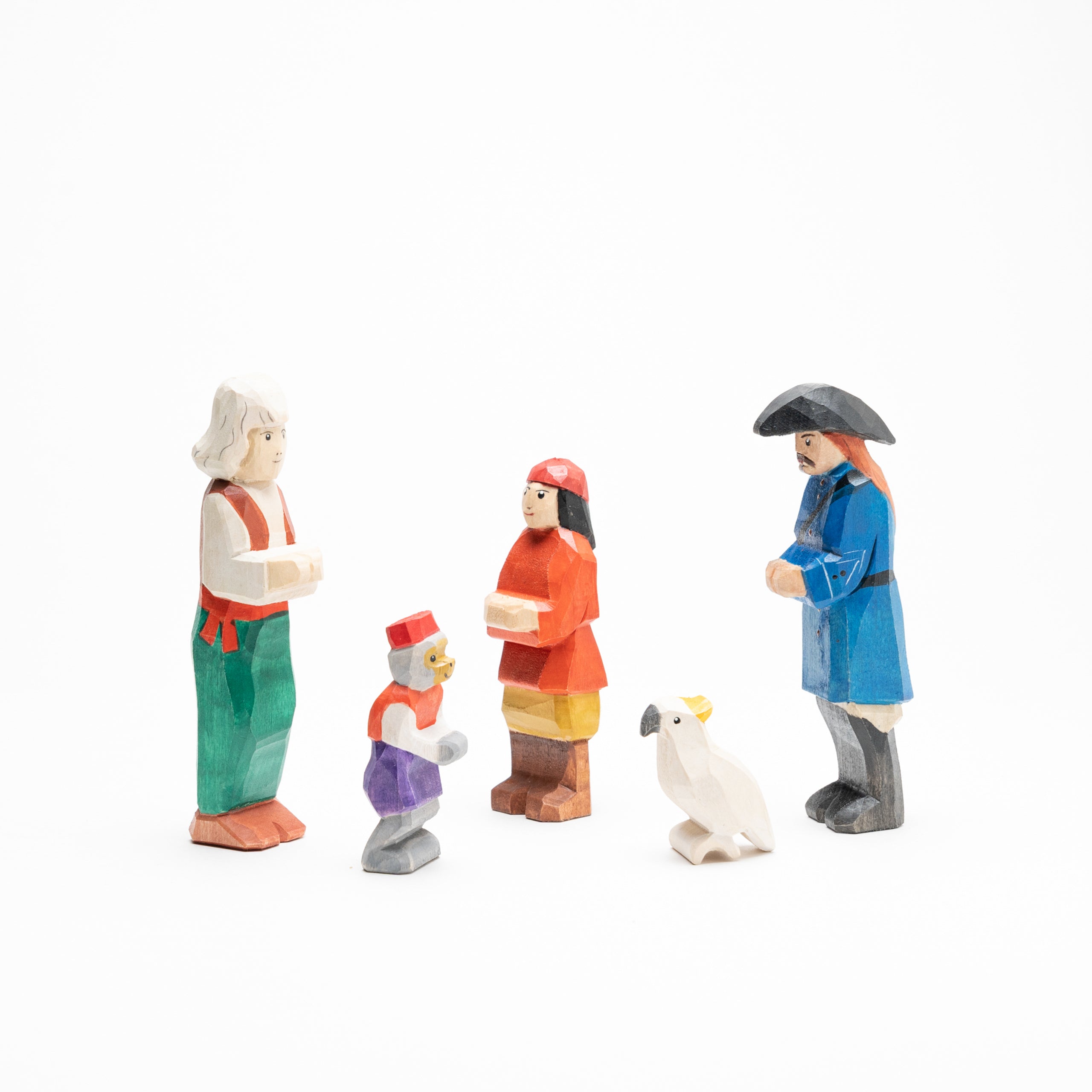 Set of colorful figurines on a white background
