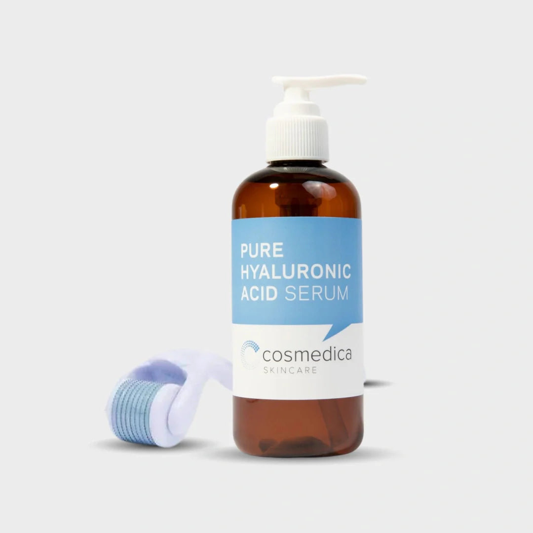 Cosmedica Skincare pure hyaluronic acid serum bottle with applicator on a light gray background