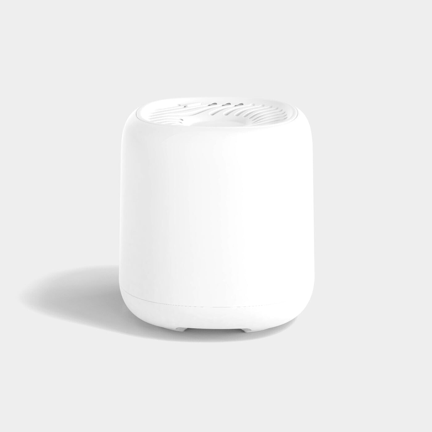 White electronic device on a light gray background