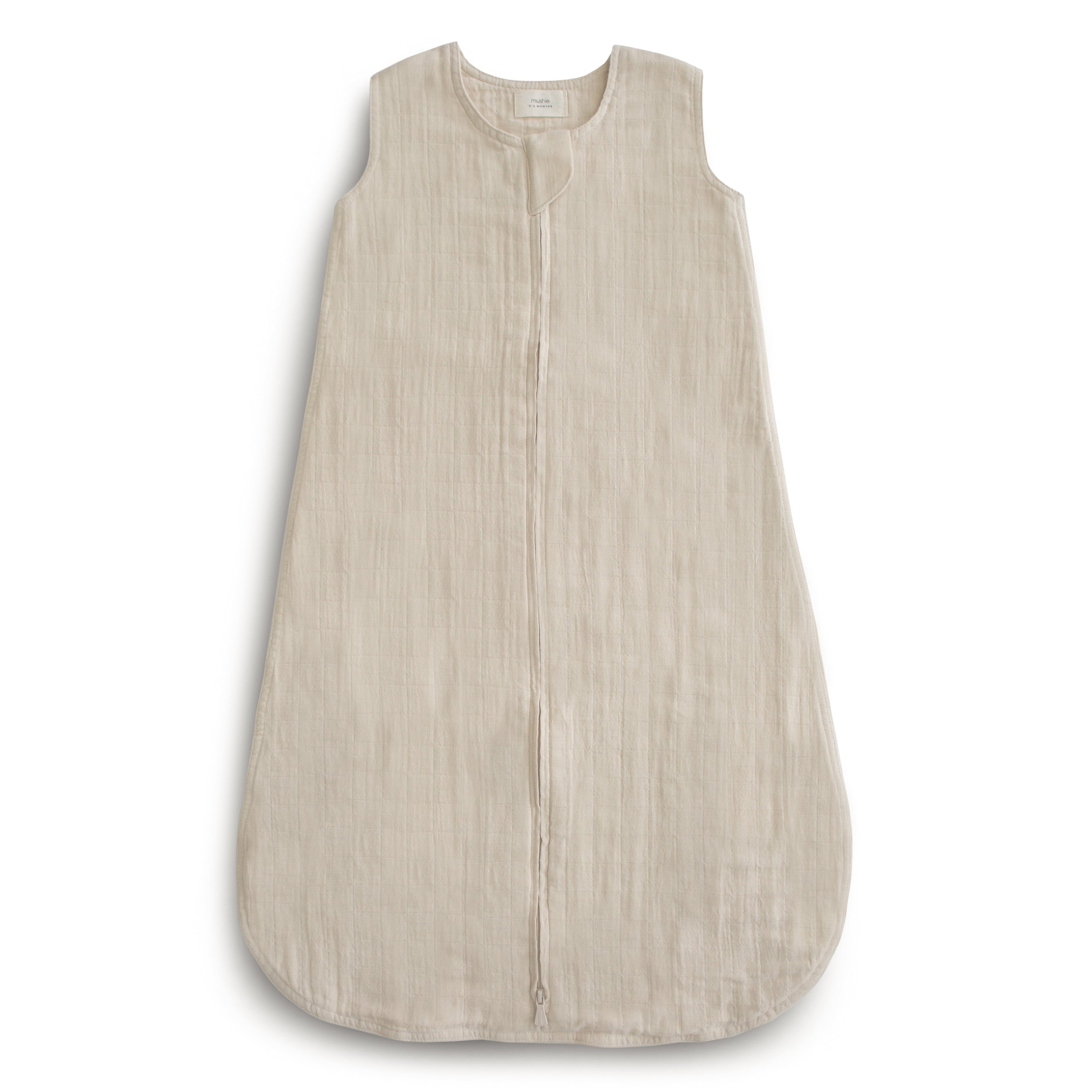 Beige sleeveless garment on a white background