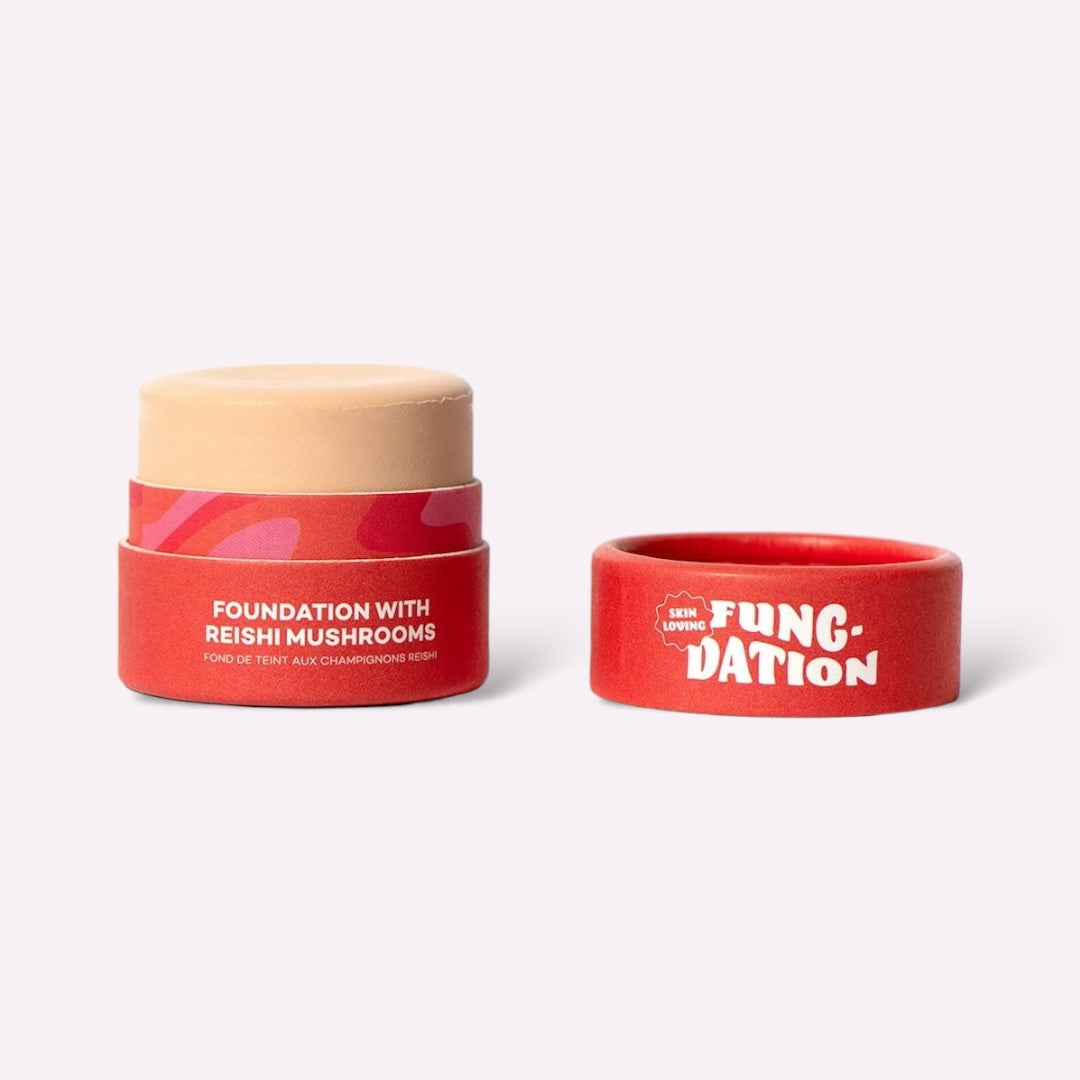 Cosmetic jar and red band with 'Fung-ation' branding on a white background