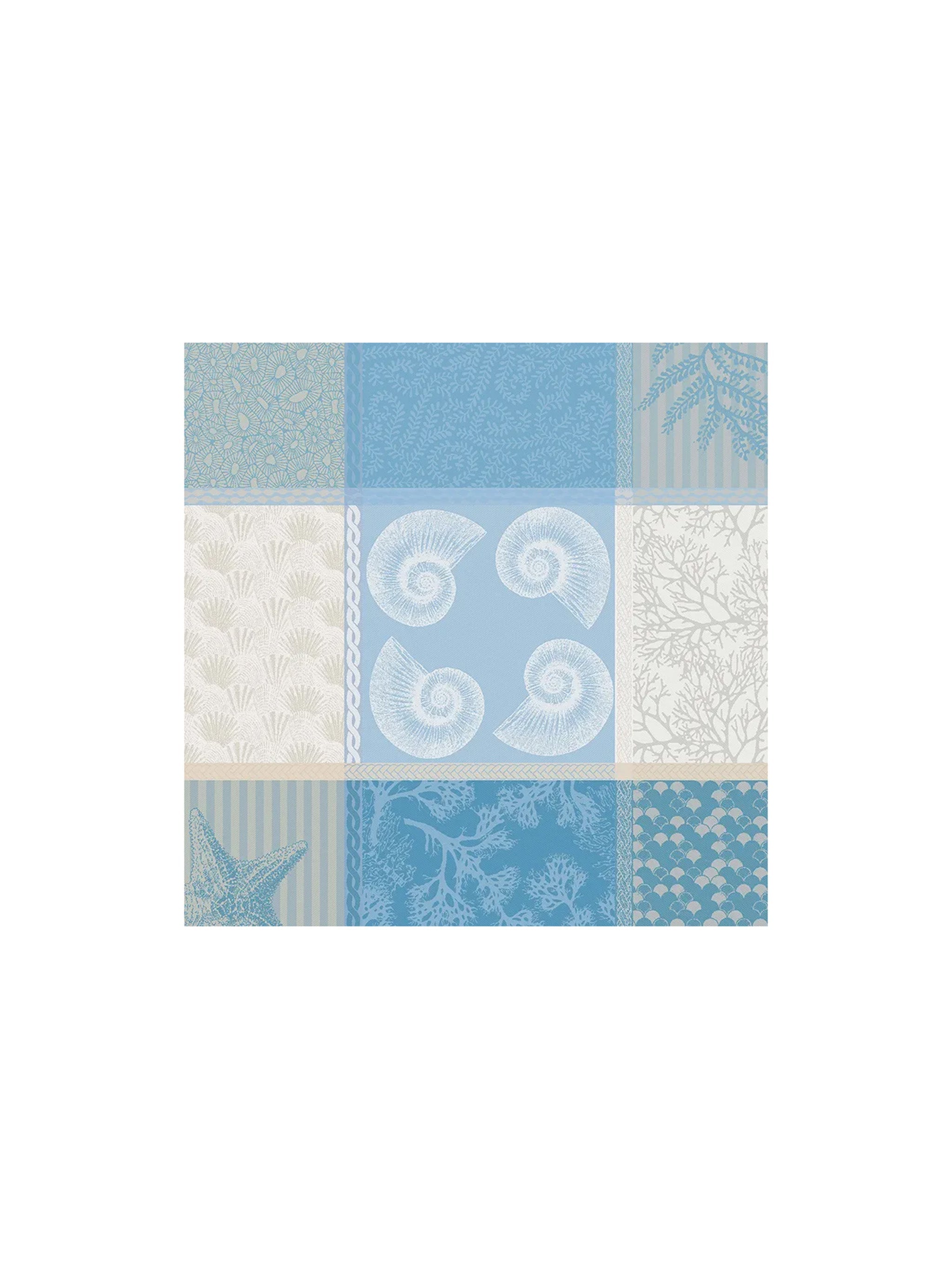 Patchwork pattern with blue and white tiles on a white background