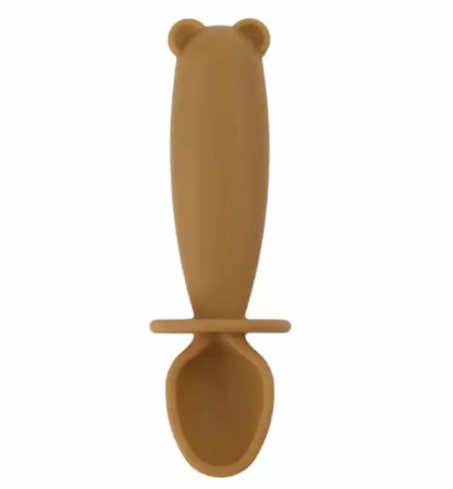 Brown bear-shaped spoon on a white background