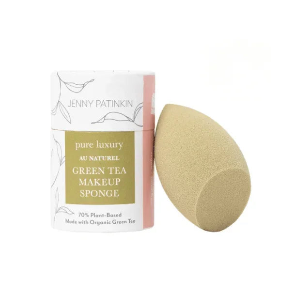 Green tea makeup sponge with packaging on a white background