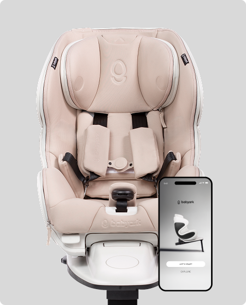 Beige car seat with smartphone displaying an app interface on a gray background