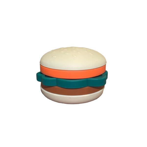 Toy hamburger with layers of different colors on a white background