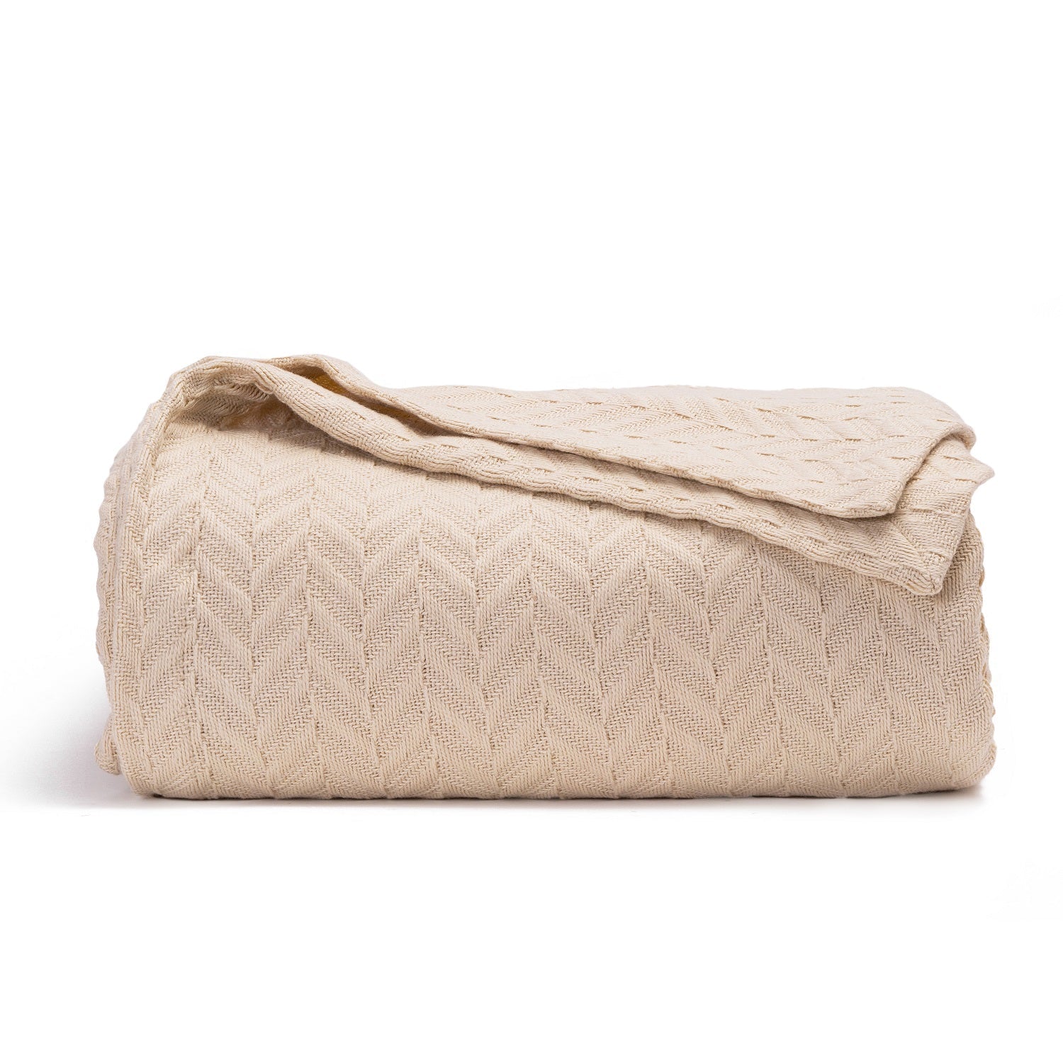 Beige quilted blanket on a white background