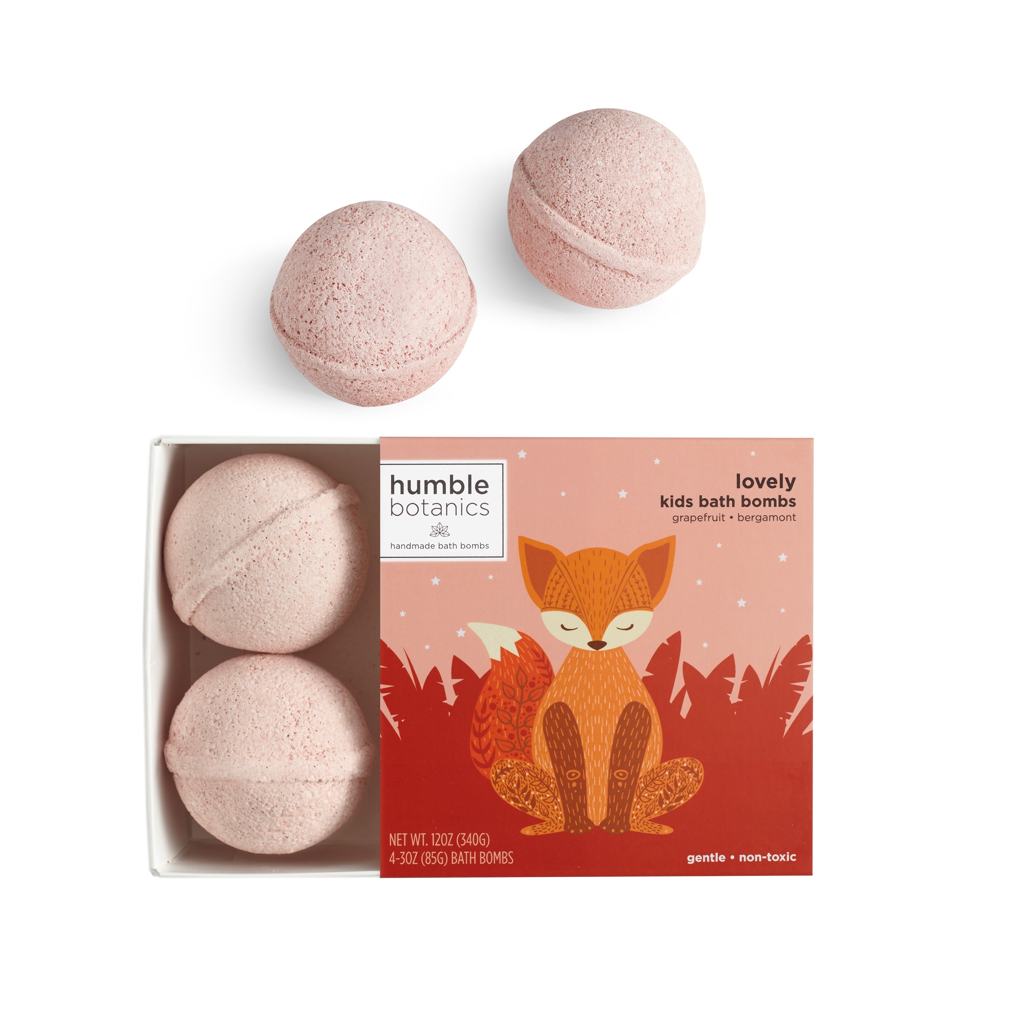 Four pink bath bombs in a box with a fox illustration on a white background