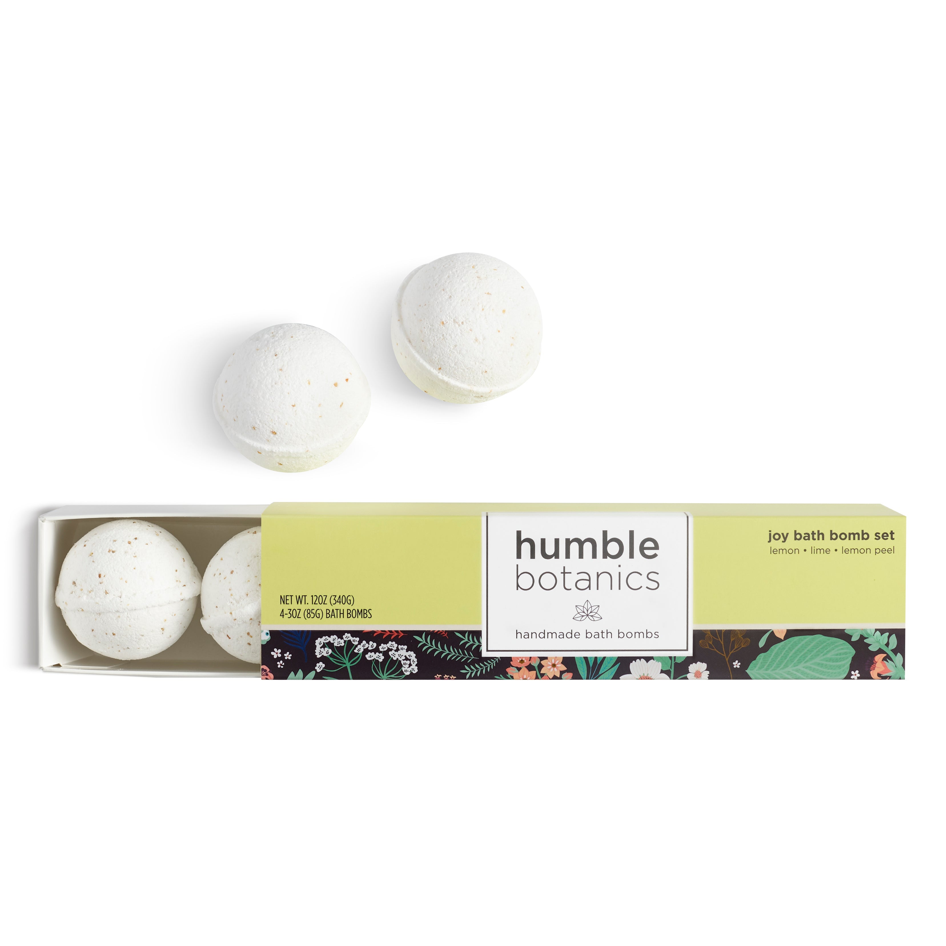 Set of bath bombs with packaging labeled 'humble botanics' on a white background