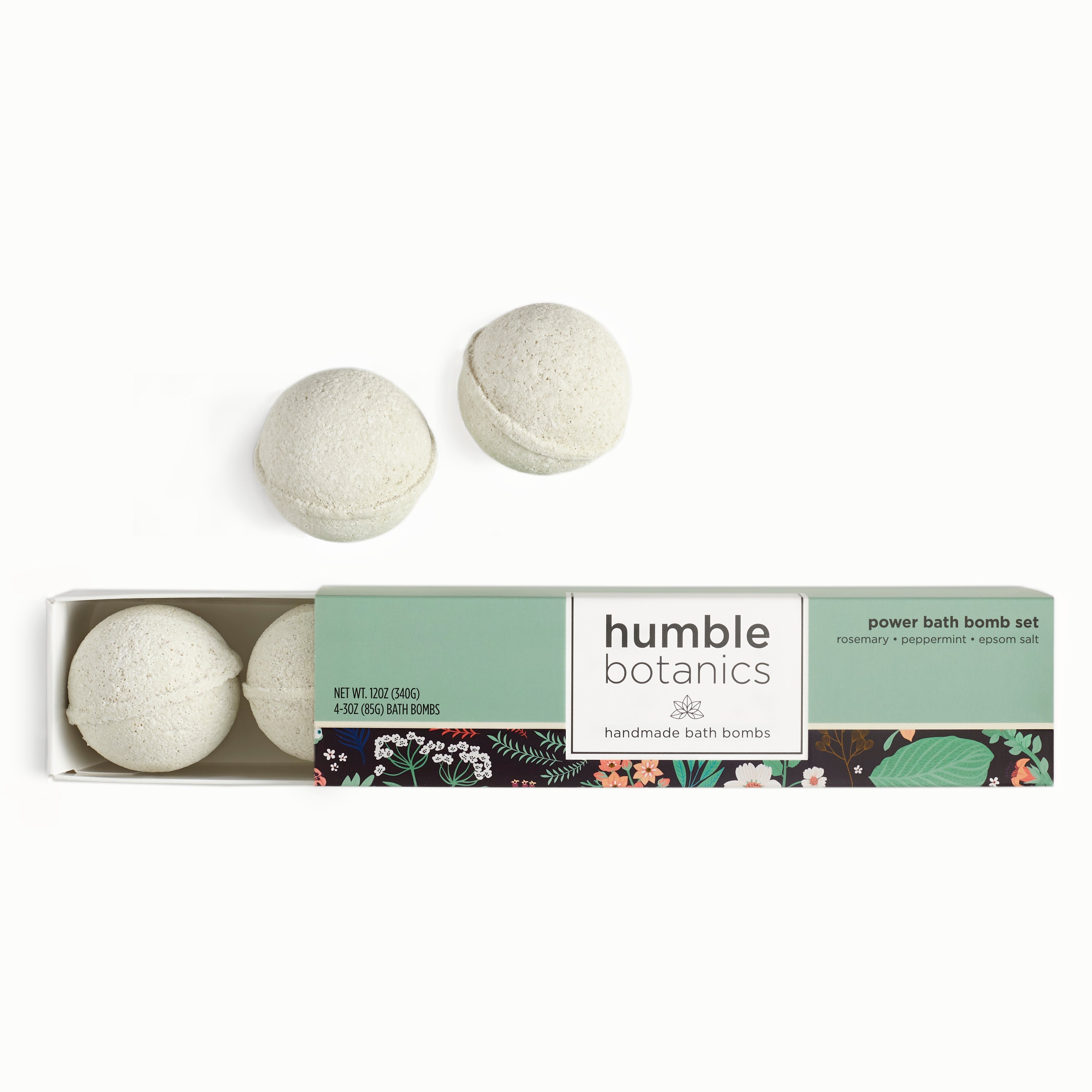 Three bath bombs in a 'humble botanics' box on a white background