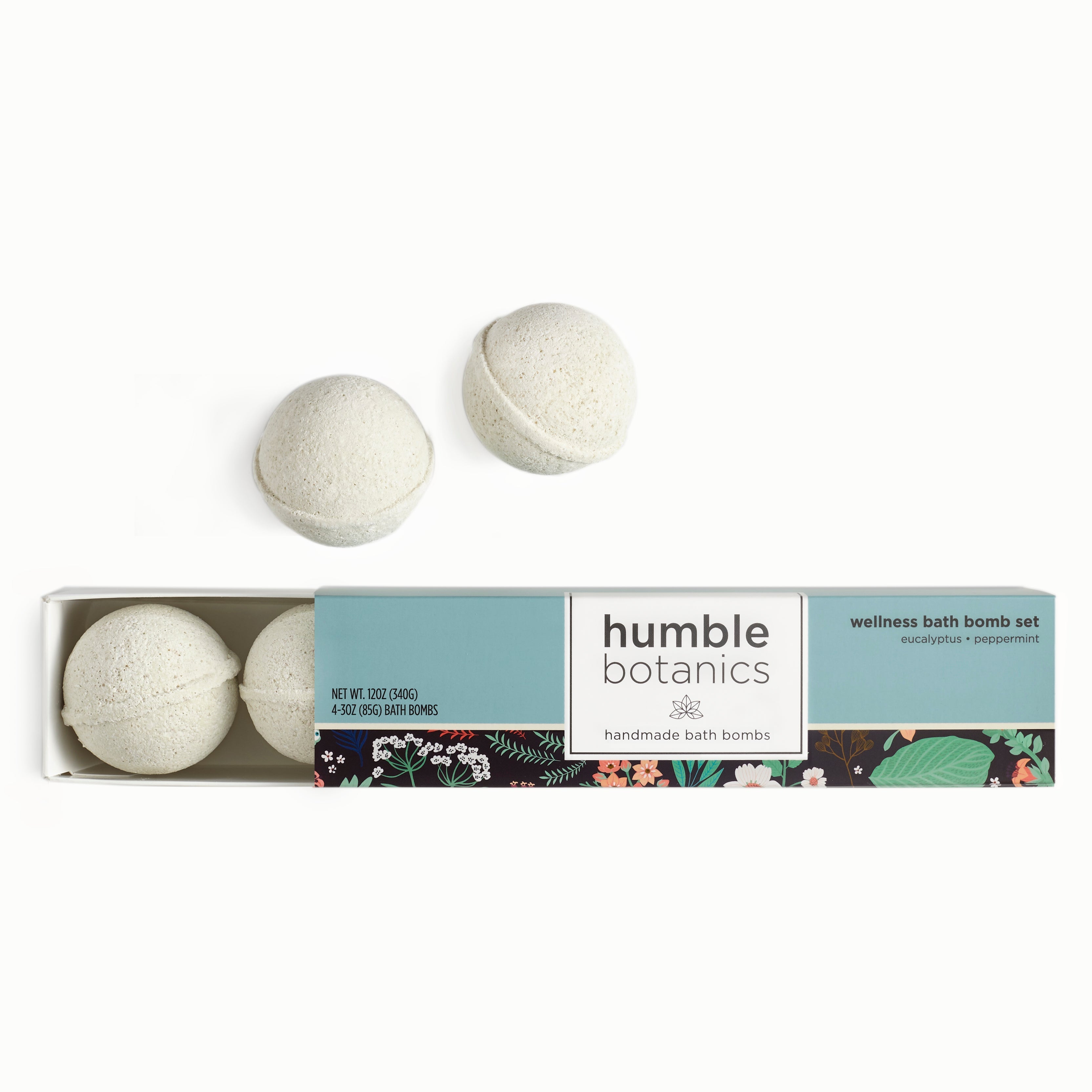 Set of bath bombs in a 'humble botanics' box on a white background