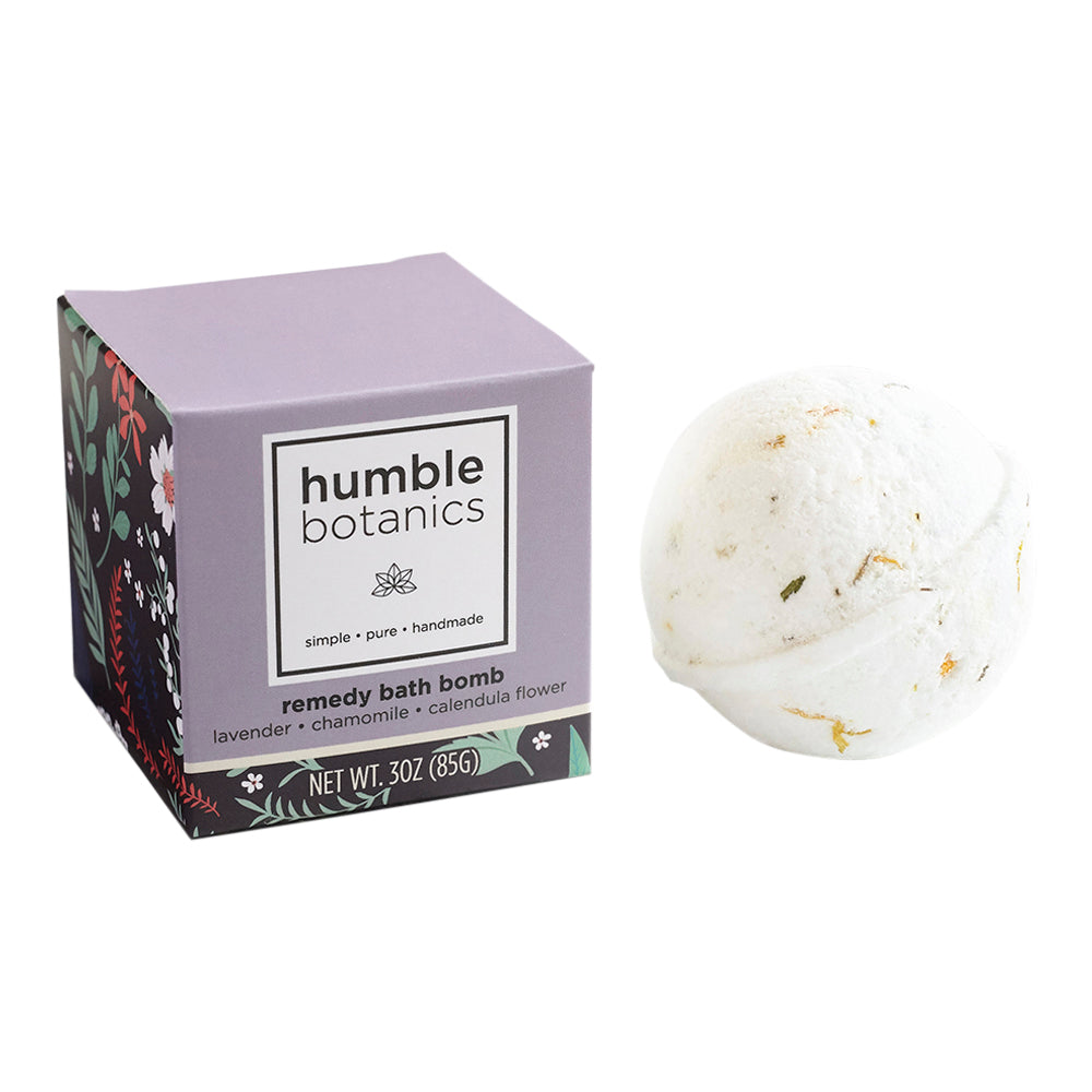 Humble Botanics remedy bath bomb with packaging on a white background