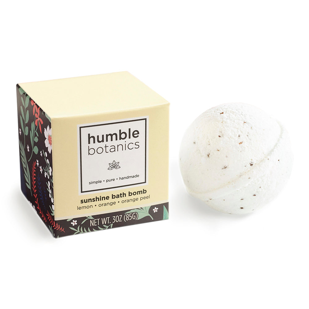 Humble Botanics sunshine bath bomb with packaging on a white background